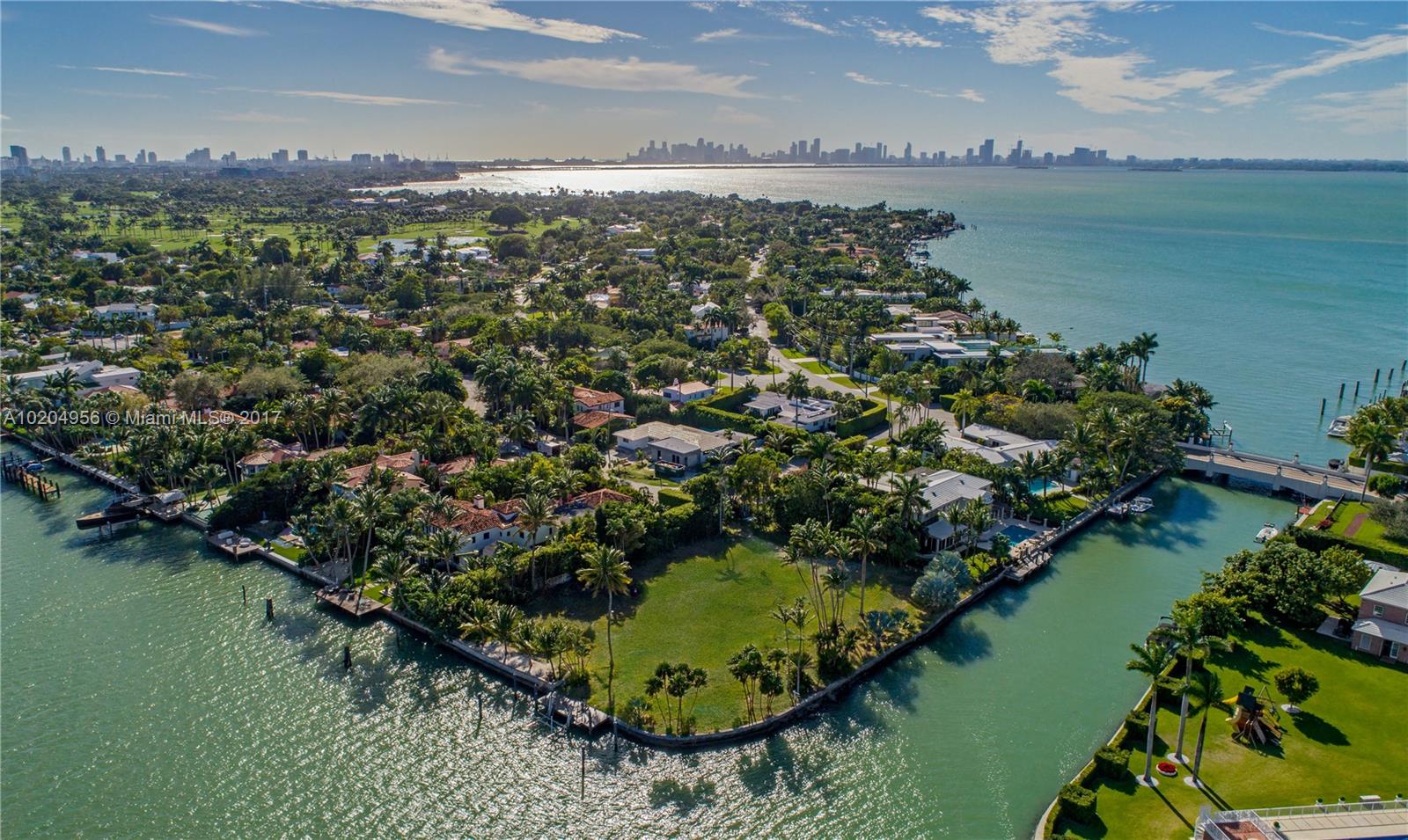 This unique 27,860 SqFt corner lot boasts 343 Feet of wrap-around water-frontage w/ vast water views across the La Gorce & Indian Creek Waterways. Create your own private sanctuary in a quiet cul-de-sac on Pine Tree Drive Circle. This property is ideal for even the largest private yachts, with unobstructed access to Biscayne Bay and the ocean. Architectural plans for a 9,256 Square Foot home by famed Miami architect Kobi Karp are available upon request, or design/build your own home up to 13,566 SqFt.