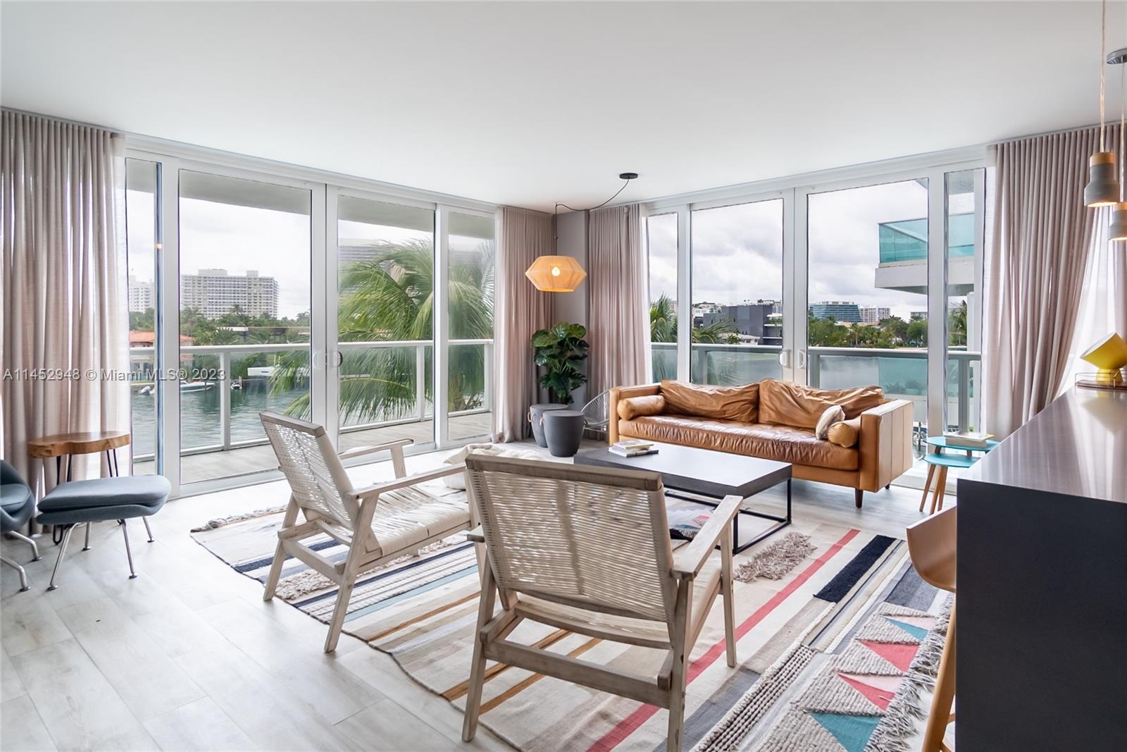 Fully furnished corner unit with amazing water views in the desirable boutique O Residences. This unit features a master bedroom with walk-in closet, access to balcony facing the Bay, bathroom with dual sinks, stand alone tub, separate shower and a water closet; 2 additional bedrooms with closets, and a Jack and Jill bathroom, one of them with access to another balcony. Ample and spacious living room, with 2 sides with floor to ceiling windows with water views and plenty of natural light. In the heart of Bal Harbor, with A+ k-8 school, walking distance to shops, restaurants, and cafes, 1 mile from Bal Harbor Shops and the beach. Amenities include 2 pools, 1 with an infinity edge and sun deck by the Bay, jacuzzi, private dock, bbq, kayaks and stand up paddle boards, gym with sauna.