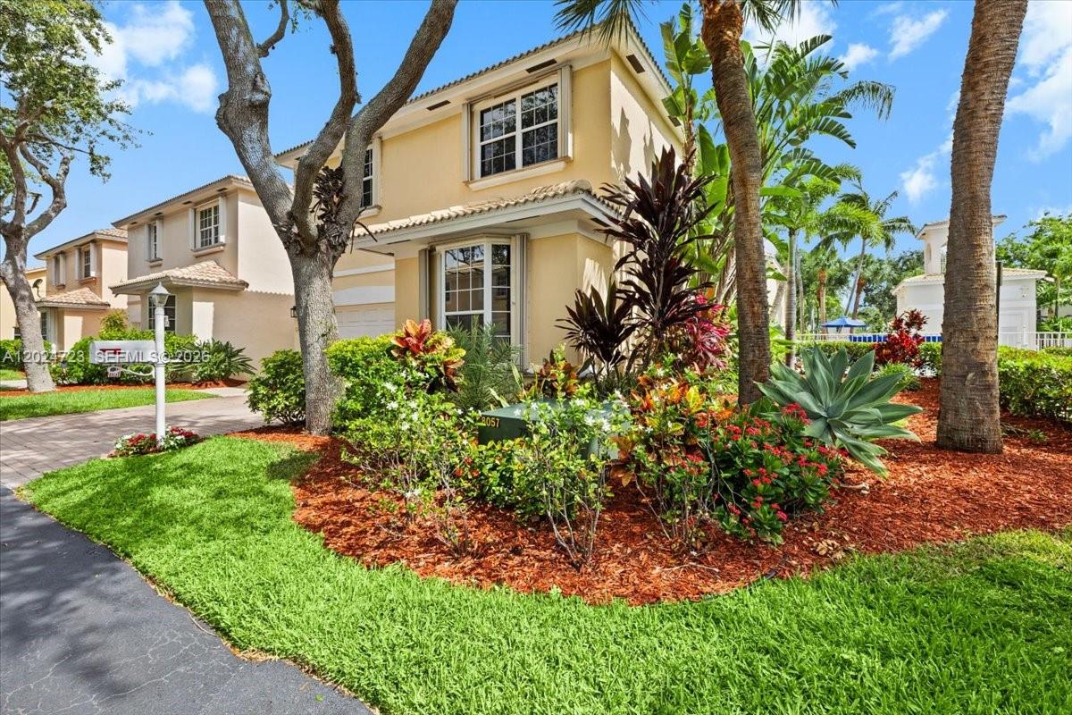 Welcome to "The Capri," a stunning move-in-ready 2-story corner home in the gated community of San Marino Village, Hollywood Lakes. This beautifully designed residence features 3 bedrooms each with a private walk-in closet, 2.5 baths, 2-car garage, and a large 2nd-floor open loft perfect as a 2nd living room, home office, or optional 4th bedroom. Inside: high ceilings, abundant natural light, granite countertops, and stainless steel appliances. Outside: a landscaped fenced patio, double brick-paver driveway, and screened porch ideal for year-round relaxation. Steps from the community pool and spa/jacuzzi with low HOA fees of only $250/mo. Perfectly positioned between Fort Lauderdale and Miami — near FLL Airport, Port Everglades, West Lake Park (hiking, kayaking), Hollywood Beach Golf Club, Hollywood Beach, local marinas, shops, and dining. Don't miss this one!