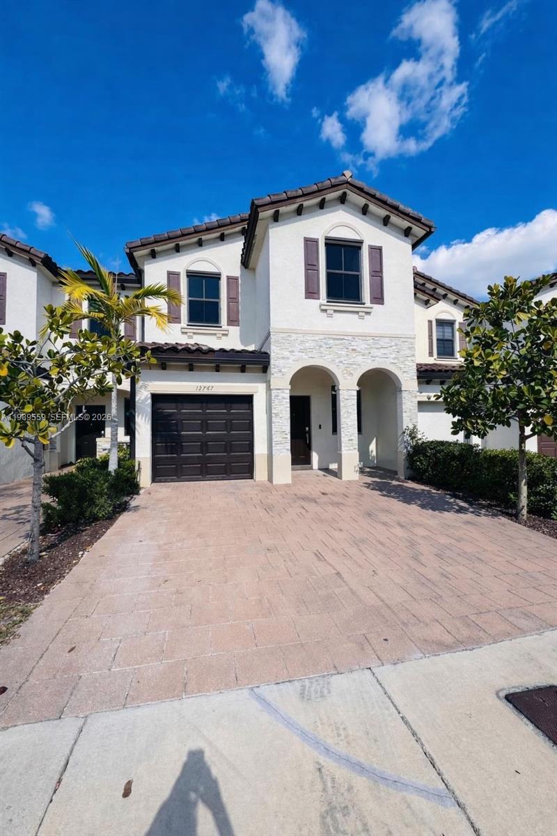 Excellent opportunity to own a 2020-built, two-level townhouse in Siena Reserves near Cutler Bay. This spacious residence offers 3 bedrooms, 2.5 bathrooms, and 2,091 sq ft of living space. It includes a 1-car garage and an extended driveway accommodating up to 3 vehicles. All bedrooms, along with the washer and dryer, are located upstairs for added convenience. The primary suite features a large layout, walk-in closet, and private bathroom. Enjoy a fenced backyard ideal for relaxing or entertaining. The community includes a clubhouse, swimming pool, and fitness center, and is conveniently located near US-1, Black Point Marina, and the Florida Turnpike.