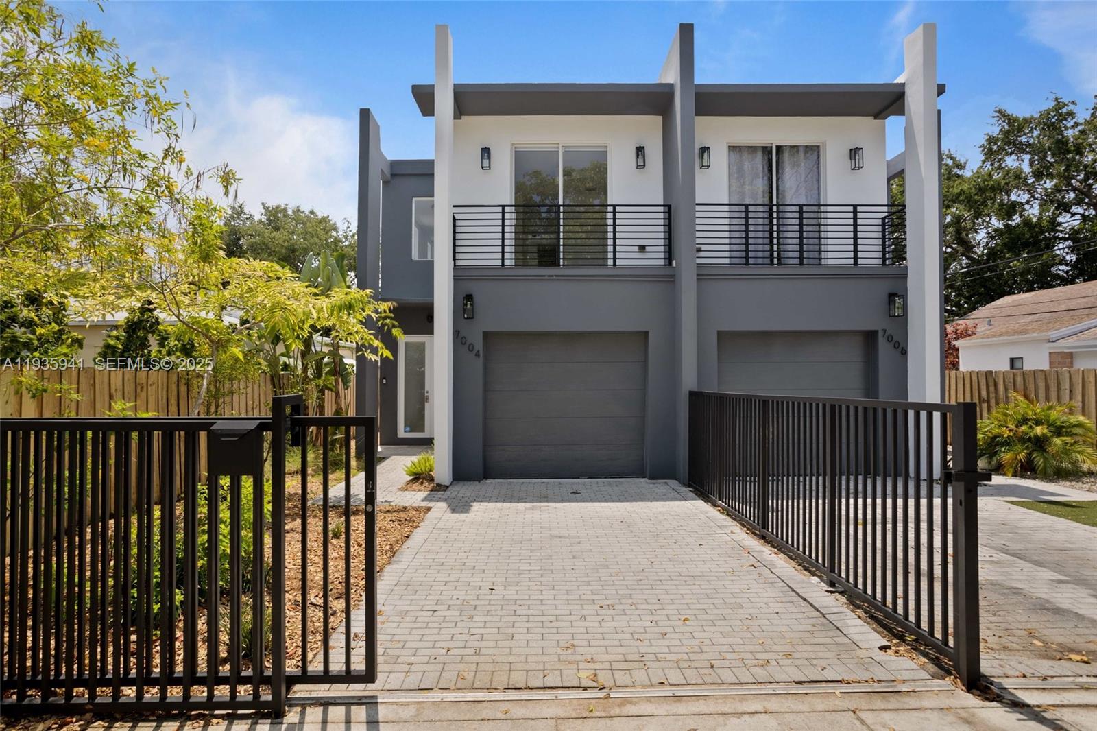 This stunning two-story townhouse, nestled in the Northeast area towards Miami Shores, exudes modern elegance and charm. Recently renovated, it boasts marble flooring throughout, high ceilings, and an abundance of natural light streaming through impact windows. The spacious interior features 3 bedrooms, 2.5 bathrooms, and a fully equipped kitchen with newly remodeled cabinets. Step outside to enjoy the tranquil terrace and garden, perfect for relaxing or entertaining guests. Additionally, the property offers a convenient laundry area with a washer and dryer, one covered parking spot with a closed gate, and another parking spot secured by a gate. With its stylish design and prime location, this townhouse is a true gem. 2230 SQFT of total building area, 1886 SQFT of living area and $11,289 for TAXES.