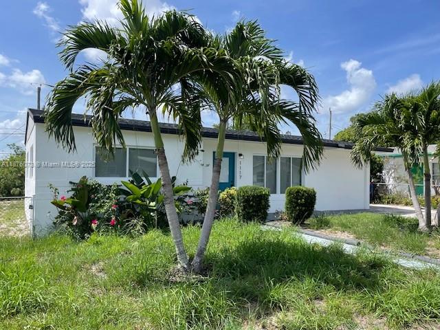 This beautiful house offers 3 bedrooms, 2 bathrooms ensuring peace of mind for years to come. Freshly Painted ,  New Roof , Impact Windows ,  Stainless Steel Appliances , Washer and Dryer  Nestled in an amazing location close to West Palm Beach downtown, Palm Beach Island and the picturesque Peanut Island, you'll enjoy convenient access to entertainment, dining, and outdoor activities. Step inside to discover a spacious interior, perfect for comfortable living and entertaining guests. This house offers a modern and fresh look throughout. Every detail has been carefully considered to create a welcoming and functional living space. AS IS.