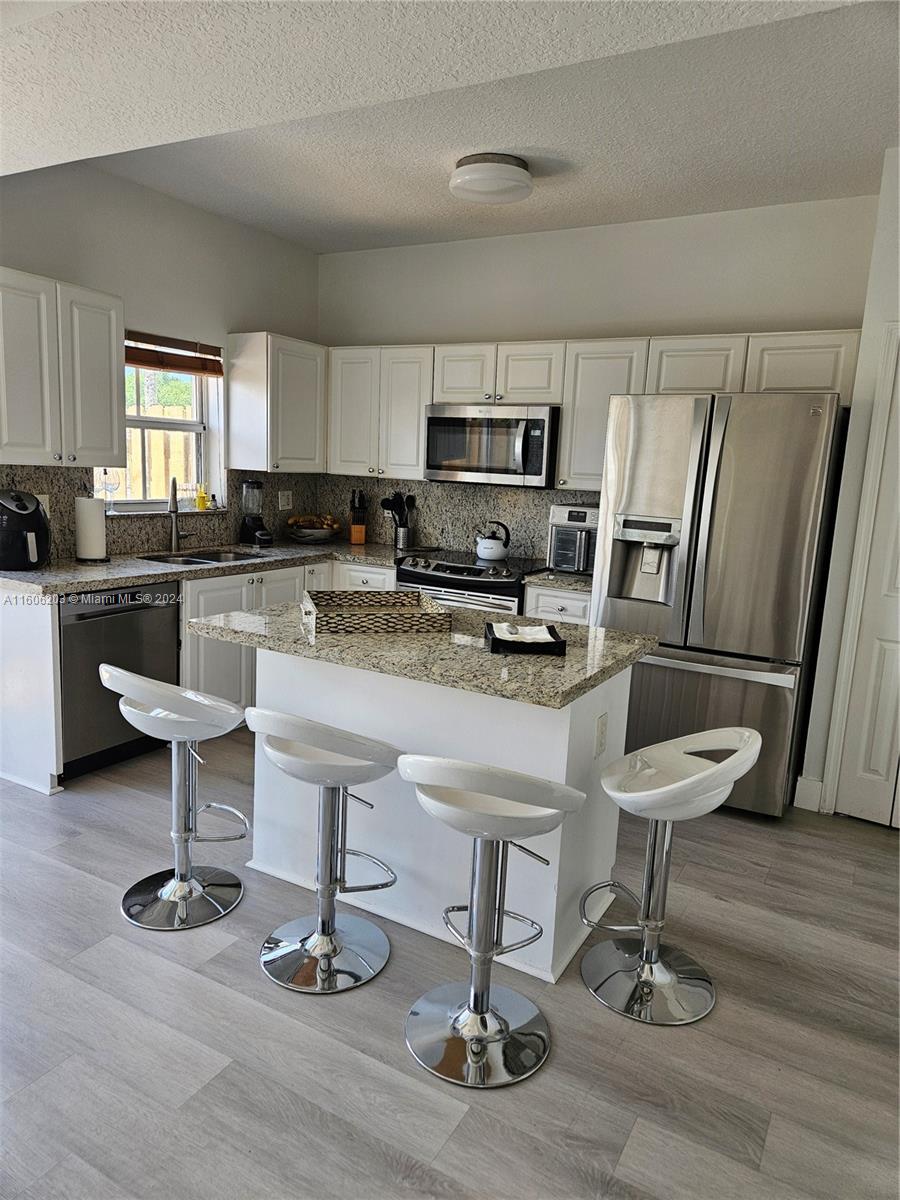 THE GATES AT DORAL ISLES - Residential Lease