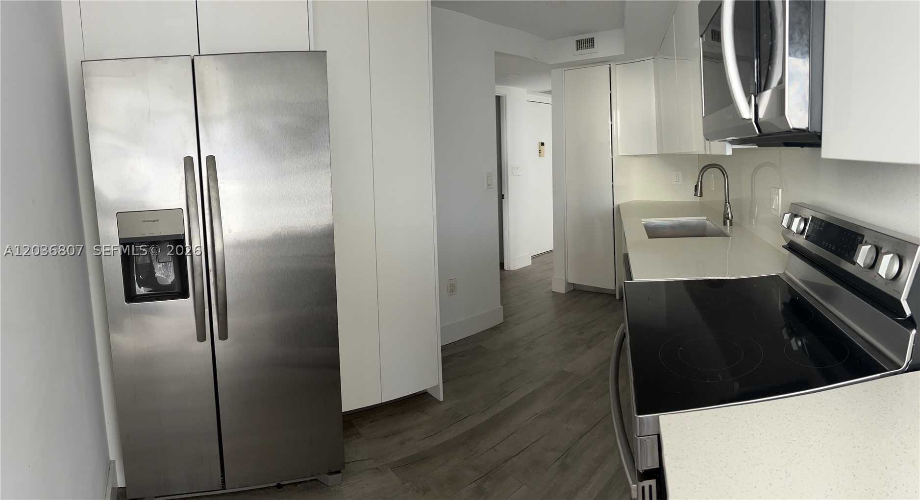 Owner Motivated!  Looking for offers for this Beautiful private unit on the 7th floor with lovely views of the surrounding area, all ages welcome, corner unit, neighbors are at a distance.  Large covered screened patio with amazing views of the area, laminated floors with upgraded kitchen and bathrooms.  Large Master bedroom and bath with separate entrance. Gated entry with community center and lots of amenities, Bowling, Tennis, Pool. Gym, Sauna and a lot more.