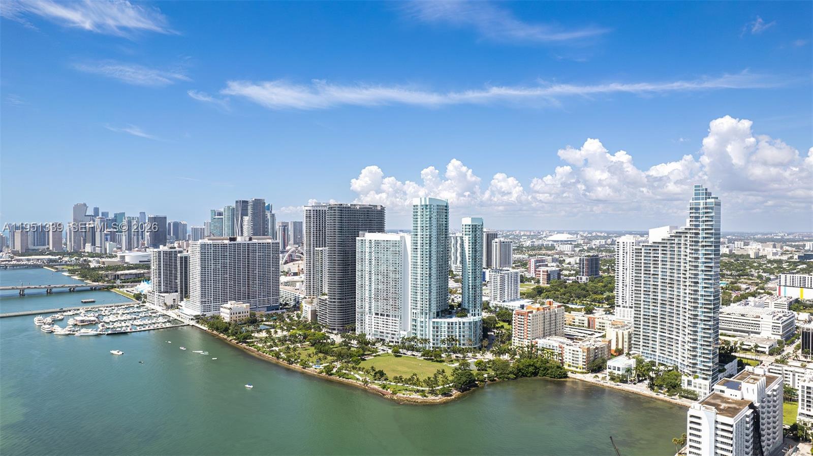 Quantum on the Bay is a striking 51-story condominium completed in 2008. Located in the vibrant Media & Entertainment District of Miami, this high-rise features a sleek glass facade and offers 698 units, each with a private balcony. The building's contemporary design and prime location provide residents with stunning views of Biscayne Bay and the Miami skyline.