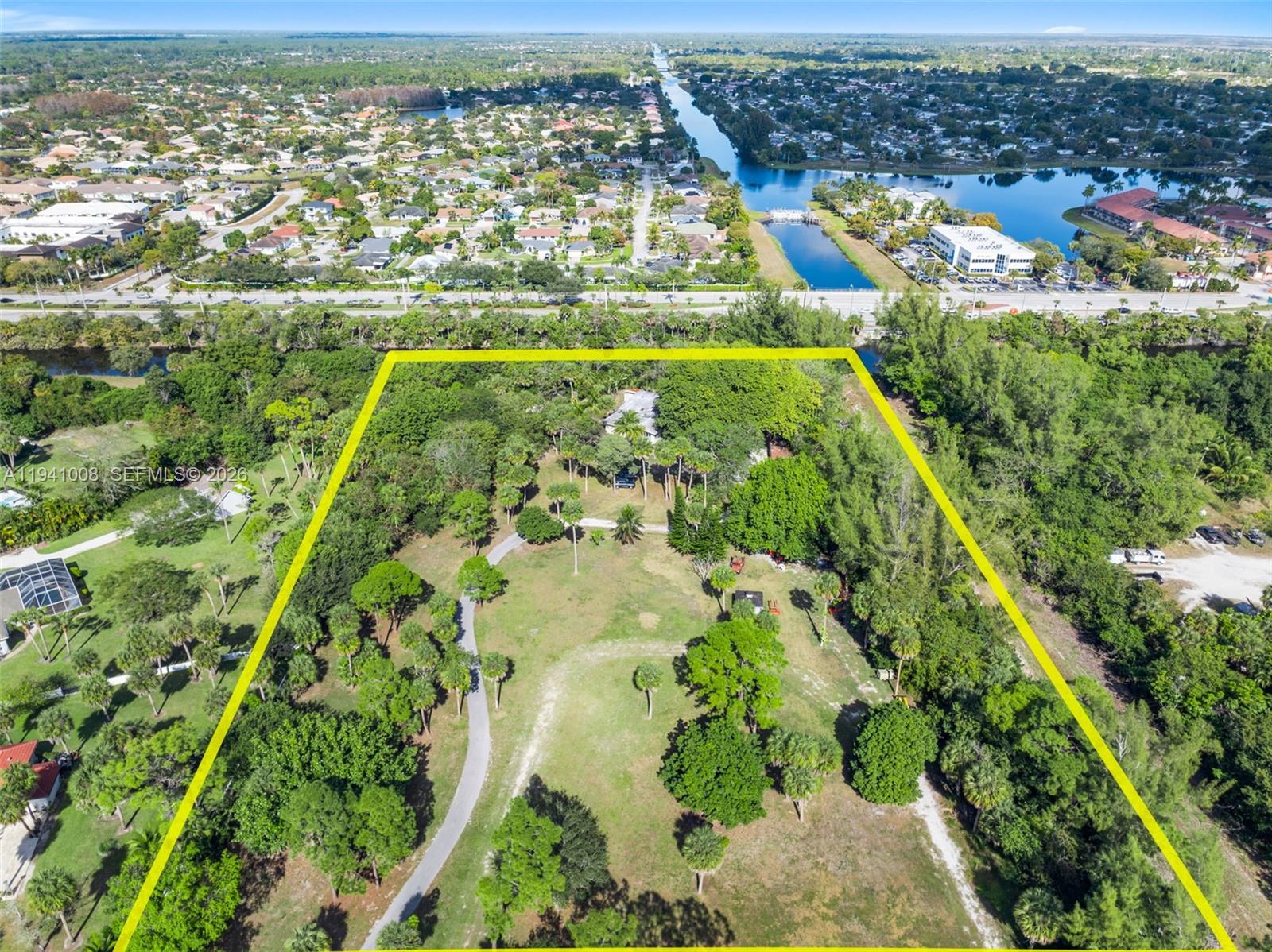 Multiple development options, supported by Village of Wellington planning guidance, define this rare 10.5-acre land opportunity with no HOA and cul-de-sac privacy in a prime acreage setting near the equestrian area and trail network. The property carries a Residential B (0.1–1.0 du/acre) Future Land Use designation, establishing planned low-density residential density with rezoning to align through the normal entitlement process. Planning analysis indicates subdivision potential, and the parcel sits directly adjacent to the Equestrian Overlay Subarea A with pathways identified for future overlay inclusion subject to approvals. The existing 3BR+den, 3.5BA residence is permitted to remain, providing immediate utility while advancing long-term plans. Village of Wellington zoning confirmation letter attached. Buyer to verify final zoning and approvals with the Village of Wellington.