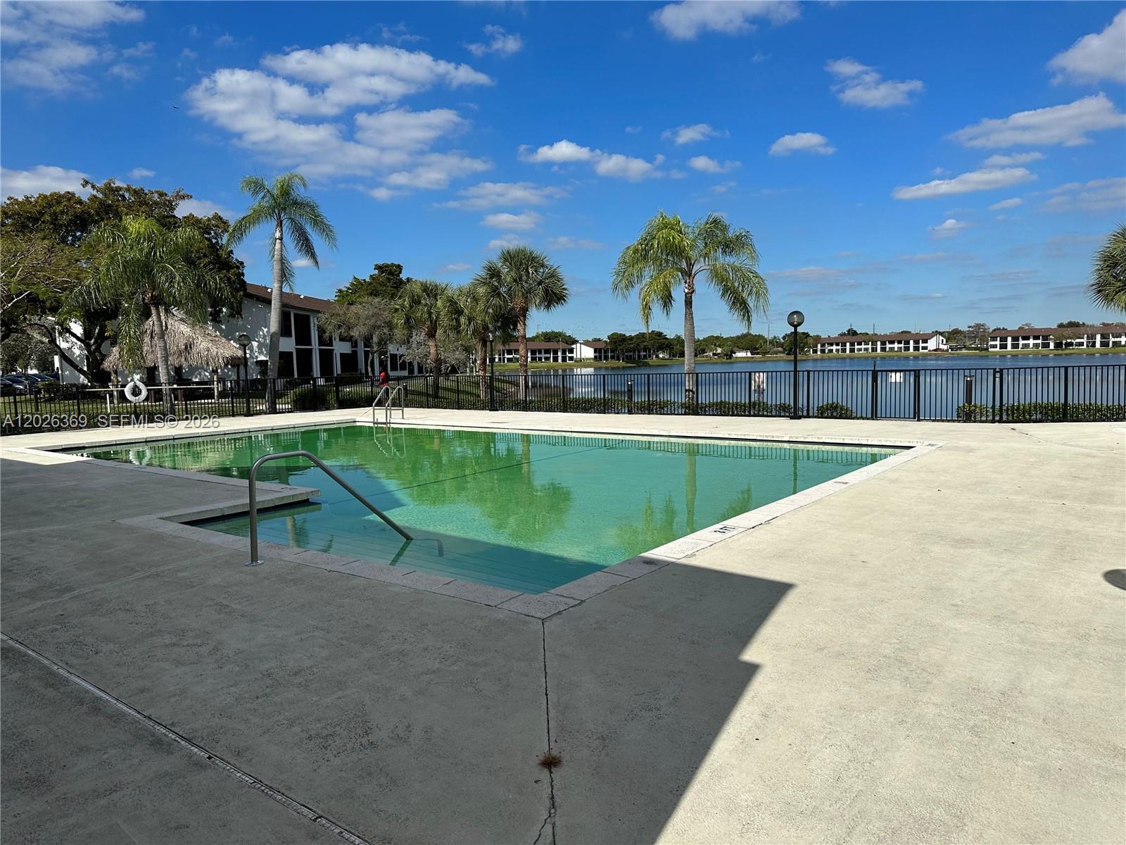 Bright and spacious. This 2 bedrooms 2 bathrooms apartment is located in OAKLAND PARK. This beautiful unit features tile flooring throughout, an open concept kitchen overlooking the living area, creating a seamless and inviting space. Enjoy plenty of natural light. Private balcony with relaxing lake views and functional layout that integrates all living spaces. The kitchen is fully equipped with stove, oven, dishwasher, refrigerator, garbage disposal, and everything needed for comfortable everyday living. Washer and dryer inside the unit. AC. Water heater. LAKE POINTE private Condominium is close to shopping, dining, and public transportation. Amenities include club house, tenis courts and pool. Tenant occupied.