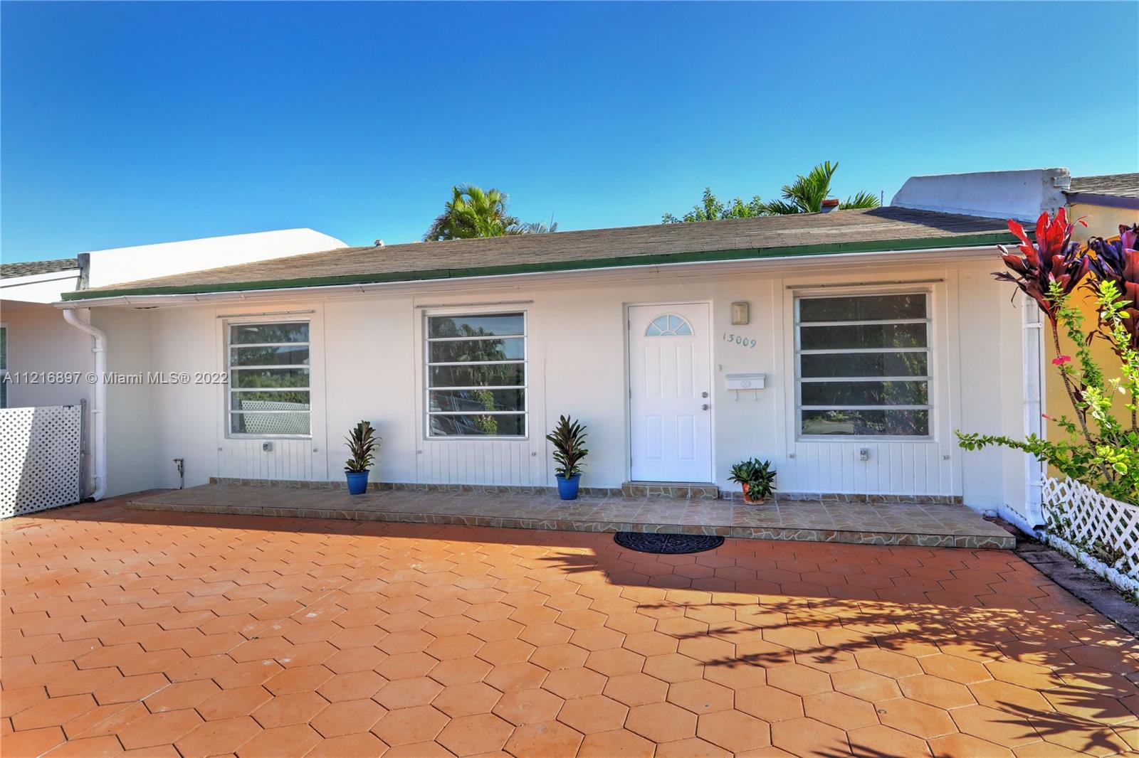 Lovely, spacious townhome with a lot of natural light is now available! Perfect opportunity to buy your first home or invest. This home is technically a 3-bedroom home but one of the bedrooms has been opened up to the living room, which can easily be changed back. The layout is very comfortable and inviting with a cozy covered and private patio right off the kitchen. It also has a utility/laundry room and has a new water heater. The exterior and interior have just been recently painted and the nicely paved driveway is very spacious. Conveniently close to the turnpike and there isn’t an HOA! Must see!