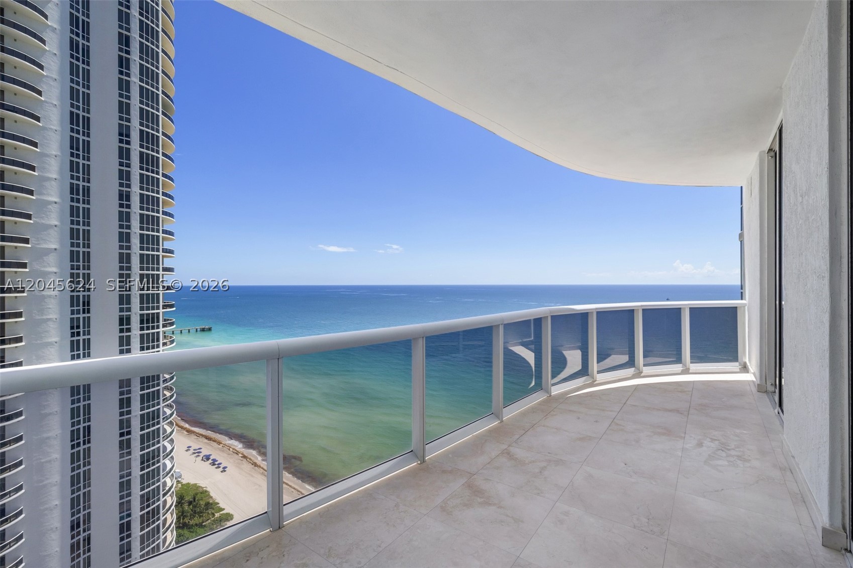 Filled with natural light and an effortless sense of calm, this residence offers a bright, inviting setting designed for both everyday comfort and memorable entertaining. Enjoy the ease of beach access just moments away, then return home to sweeping sunrise and sunset views from two oversized verandas made for morning coffee, evening cocktails, and relaxed gatherings.

The apartment features 3 generous bedrooms, 3 full bathrooms, a powder room, private elevator entry, assigned parking, and the convenience of no valet requirement. Every detail is designed to offer space, privacy, and an elevated coastal lifestyle.