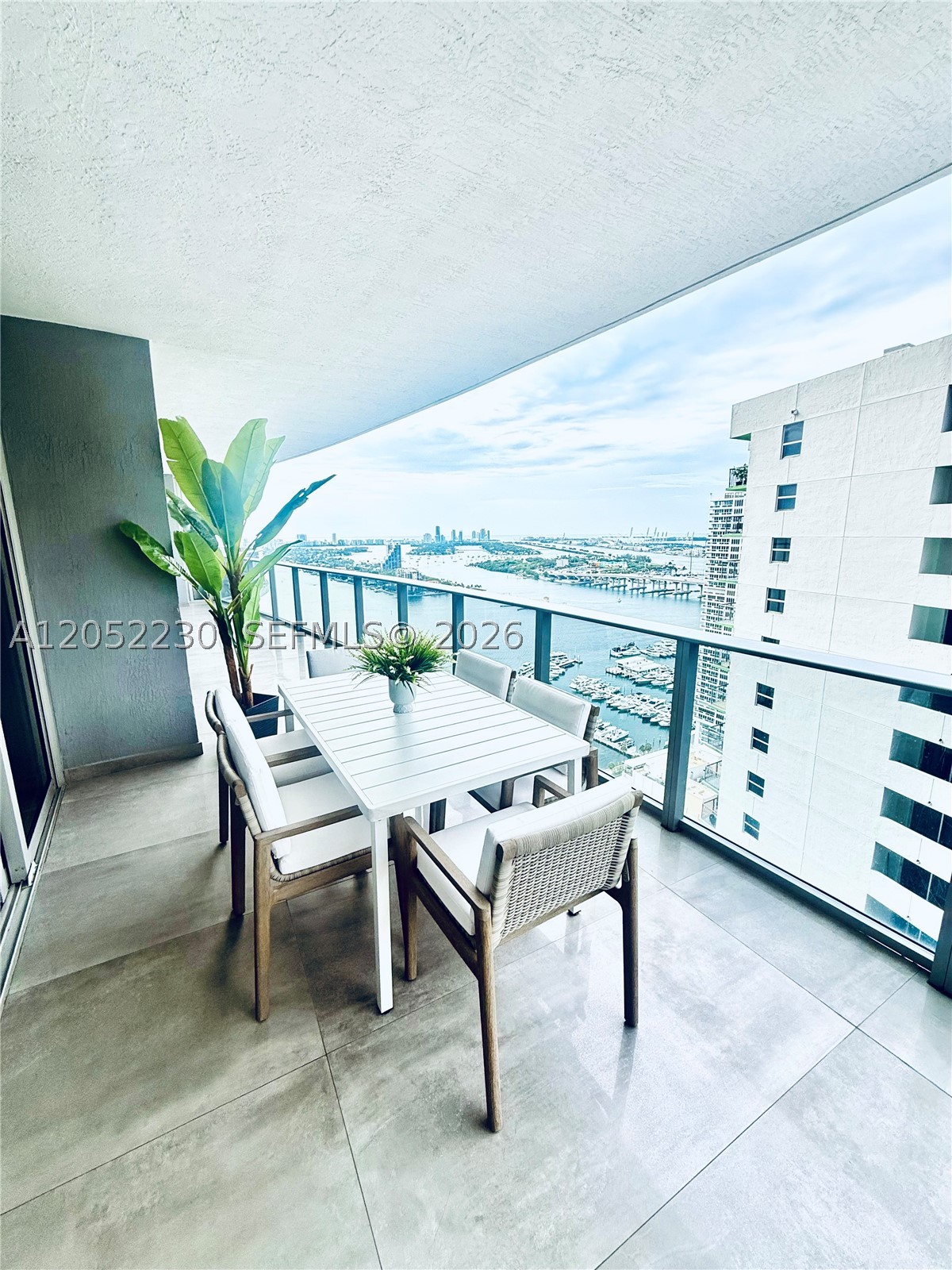 Experience luxury living in this spectacular fully furnished 3-bdrm, 3.5-bth residence at *Aria on the Bay*. Pvt Elevator foyer. This move-in-ready home features a spacious open-concept layout with floor-to-ceiling impact glass, natural light, and breathtaking city and bay views. Each of the **three bdrms offers direct access to a private balcony**, creating a seamless indoor-outdoor living experience & providing every room with its own connection to the stunning surroundings.

The gourmet kitchen is appointed with premium cabinetry, quartz countertops, stainless steel appliances, & ample storage, making it ideal for everyday living & entertaining. The elegant furnishings complement the contemporary design, allowing you to move in with ease.

The residence includes **two assigned parking spaces**, a highly desirable feature in the heart of Miami.

Residents of Aria on the Bay enjoy exceptional resort-style amenities, including sunrise & sunset swimming pools, a state-of-the-art fitness center, yoga studio, spa, theater, business center, children's playroom, game room, BBQ area, 24-hour doorman, valet parking, & security. Ideally located in the vibrant Edgewater neighborhood, just minutes from Margaret Pace Park, Adrienne Arsht Center, Museum Park, Wynwood, the Design District, Brickell, Miami Beach, & Miami International Airport. This exceptional residence offers the perfect combination of luxury, comfort, & convenience in one of Miami's premier waterfront communities.