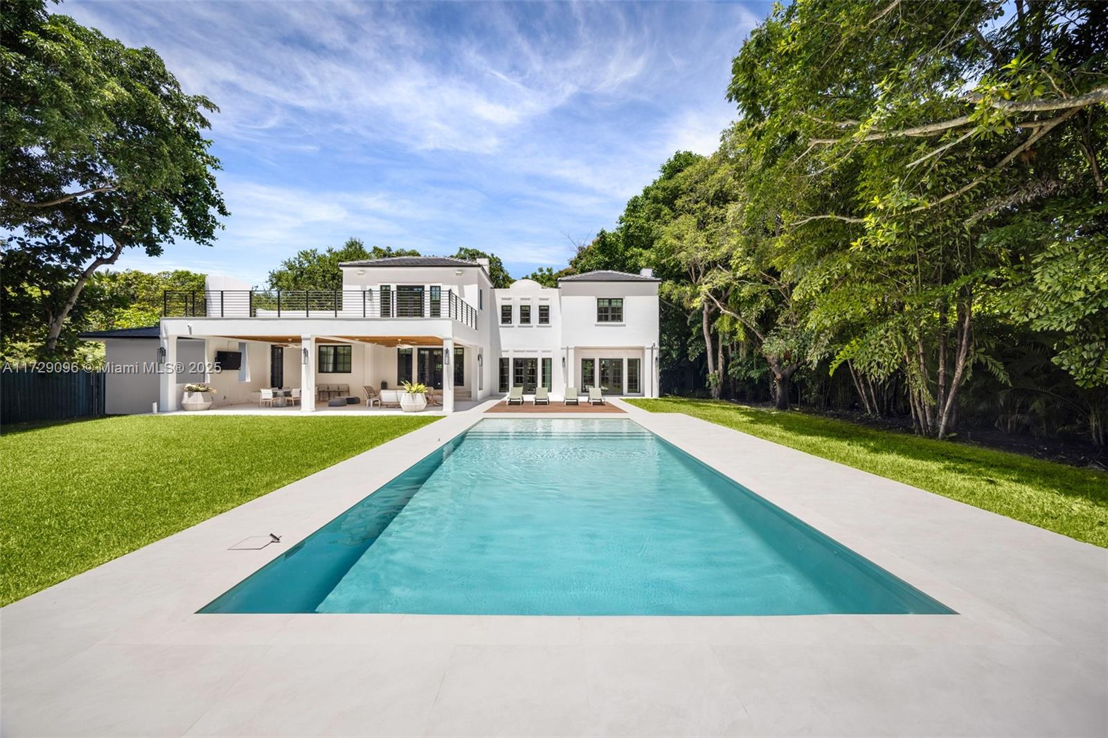 Discover this stunning two-story home in the prestigious Hammock Lakes gated community. This completely remodeled designer masterpiece features 4 bedrooms, an elegant home office, and a versatile den that can be used as an additional family room, playroom, or even an additional bedroom. The home boasts top-of-the-line finishes and appliances, seamlessly blending modern luxury with timeless style. A private elevator provides effortless access to both levels of the home. Step outside to your private oasis—a beautifully landscaped backyard with a brand-new, magnificent pool, perfect for entertaining, relaxing, or letting kids play in the spacious yard. Don’t miss the opportunity to own this exceptional property!