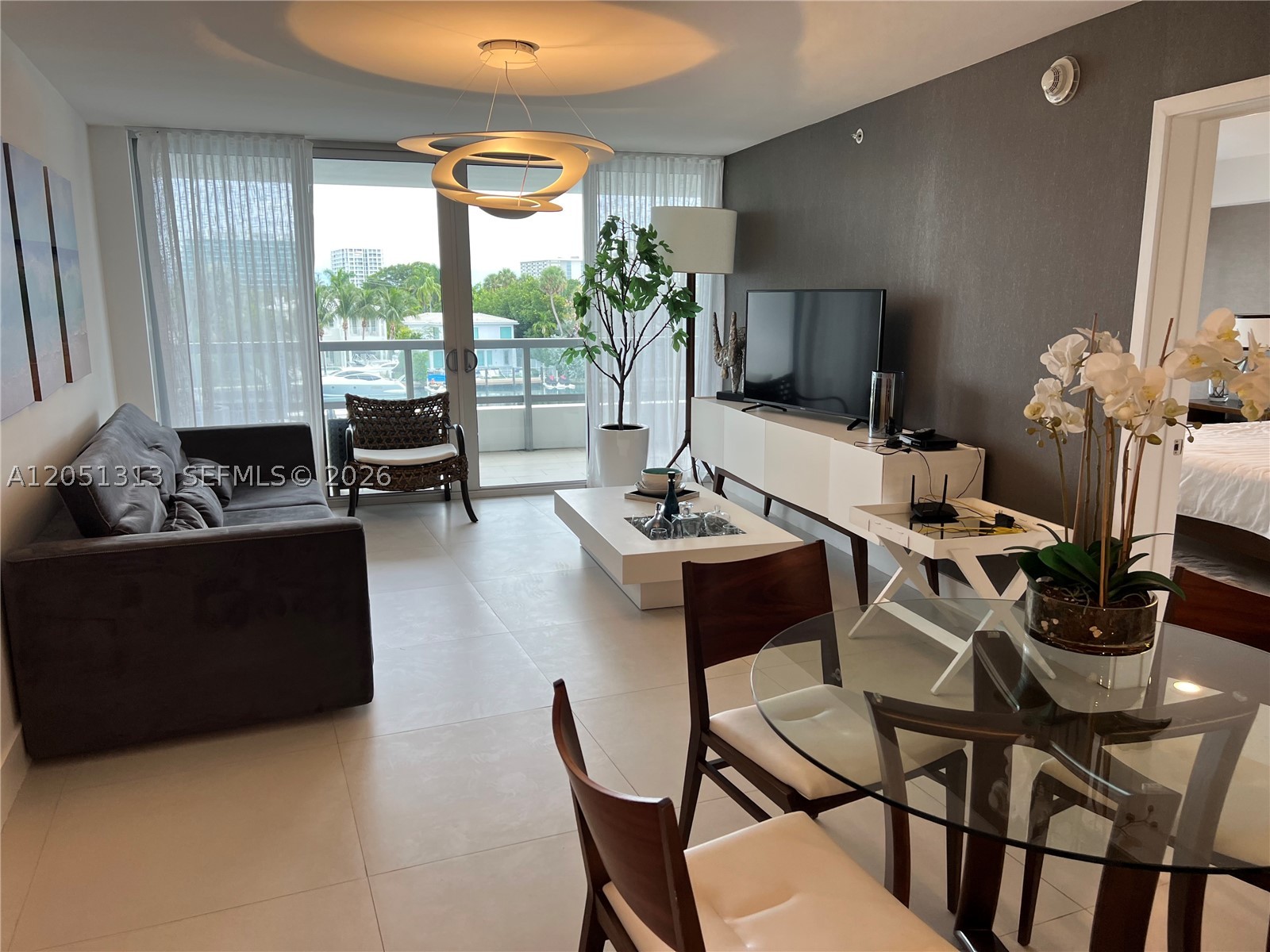 Exceptional rental on the island. Very spacious 1bd w/den and 2 ba. Tastefully decorated and furnished. Direct Waterview with big balcony. Great price for Bay Harbor Islands in a new boutique buliding, close to restaurants, shopping, and beach.  Amazing roof top pool . Great big air conditioned storage right across the unit .A pleasure to see and easy to show. *** TENANT ONLY ALLOWS SHOWINGS TUES/THURS 11AM-2PM*****. Text listing agent for showings .