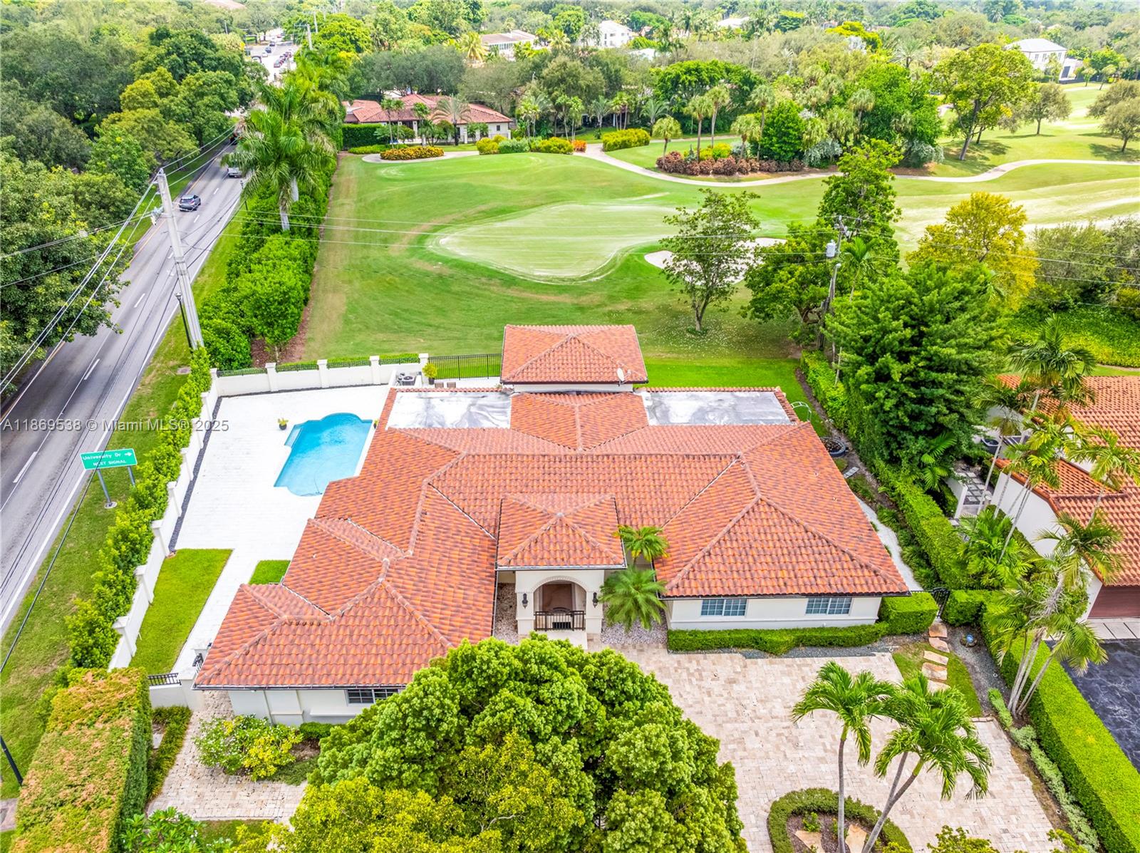 Situated on the prestigious Santa Maria Street within “The City Beautiful,” Coral Gables, this elegant single-story residence offers refined living in one of Miami’s most coveted neighborhoods. Perfectly situated on a 15,345 Sq.Ft. corner lot along the 3rd hole of the exclusive Riviera Country Club, this home offers sweeping golf course views and a lifestyle of prestige. Spanning 3,884 Sq Ft, the property features 5 bedrooms and 4 bathrooms, blending timeless design with modern comforts. Interiors showcase marble flooring, wood floors in the bedrooms, high-impact windows and doors, and a chef’s kitchen with premium appliances. The private backyard retreat is anchored by a heated saltwater pool, ideal for family gatherings or tranquil mornings overlooking the lush fairways.