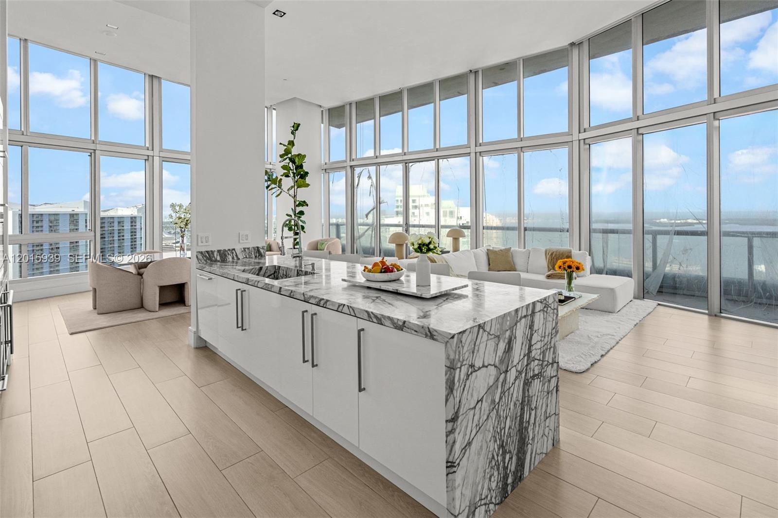 Icon Brickell APT 4101 is a corner-unit that that offers 180+ degrees of ocean views and ceilings so tall you’ll need scaffolding to change a lightbulb. The 55-foot long balcony is great for sunrise coffee or casual walks if you’re just shy of your daily step count. The unit was recently fully-renovated and the 3-br was thoughtfully converted into a 2-br to create the largest living room in all of Brickell. Amenities include a fitness center and the largest residential pool in the US, not to be confused with the ocean. The world-class spa is a great place to relax and enjoy your mortgage. Long gone are the days living above 7-Eleven as the building is home to some of the finest restaurants in Miami such as Cantina La Veinte, Cipriani, The Living Room, and CÉ LA VI.