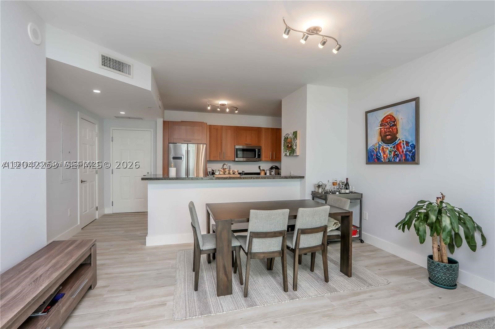 AVAILABLE SEPT. 4, 2026 - CORAL GABLES CONDO RIGHT ON THE PRESTIGIOUS PONCE DE LEON BLVD. This beautiful 1/1½ unit offers high ceilings, chic tile flooring, elegant kitchen with Italian cabinetry, granite counter tops and stainless-steel appliances. Bathroom has both a roman tub and a separate shower. The unit has been updated to offer a beautiful, bright space with views of Downtown and Brickell. One assigned parking space. Catch the Coral Gables Trolley right outside your building door and take a two-minute ride to Miracle Mile, restaurants, shopping and entertainment. The building is full of amenities: 24/7 Concierge/security, modern gym, event room and pool. Move in ready. Excellent condition . It's a must see!