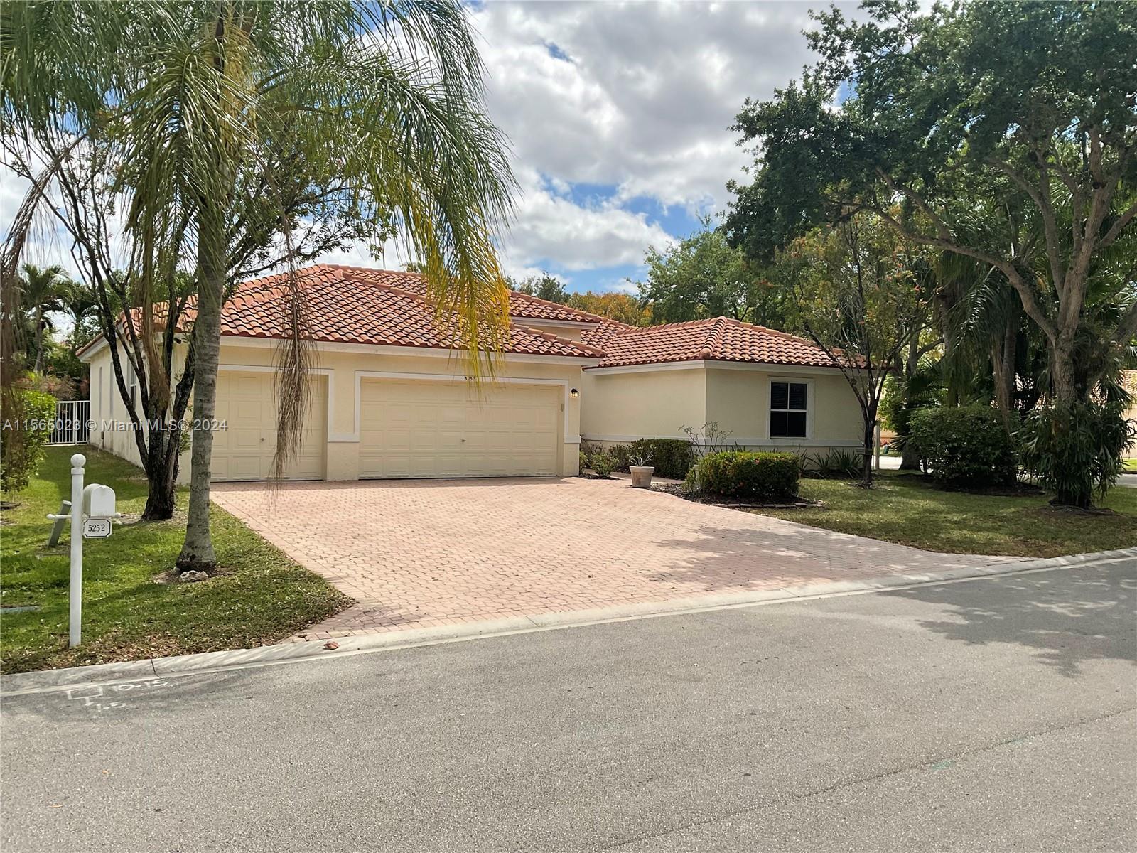 This large, recently renovated 4 bedroom, 3 bath home on a corner lot in the Lake Como gated community is the best value in the area! Featuring a spacious split floor plan, 9-foot ceilings, a large master suite with walk-in closets and a separate tub and shower. You will love lounging by the pool under the covered terrace! With its recently updated appliances, roof and pool pump, this home is ready to move in and enjoy with no work required. The 3-car garage provides plenty of room for your vehicles or extra storage. Located in Coconut Creek near the expressway with excellent schools nearby.