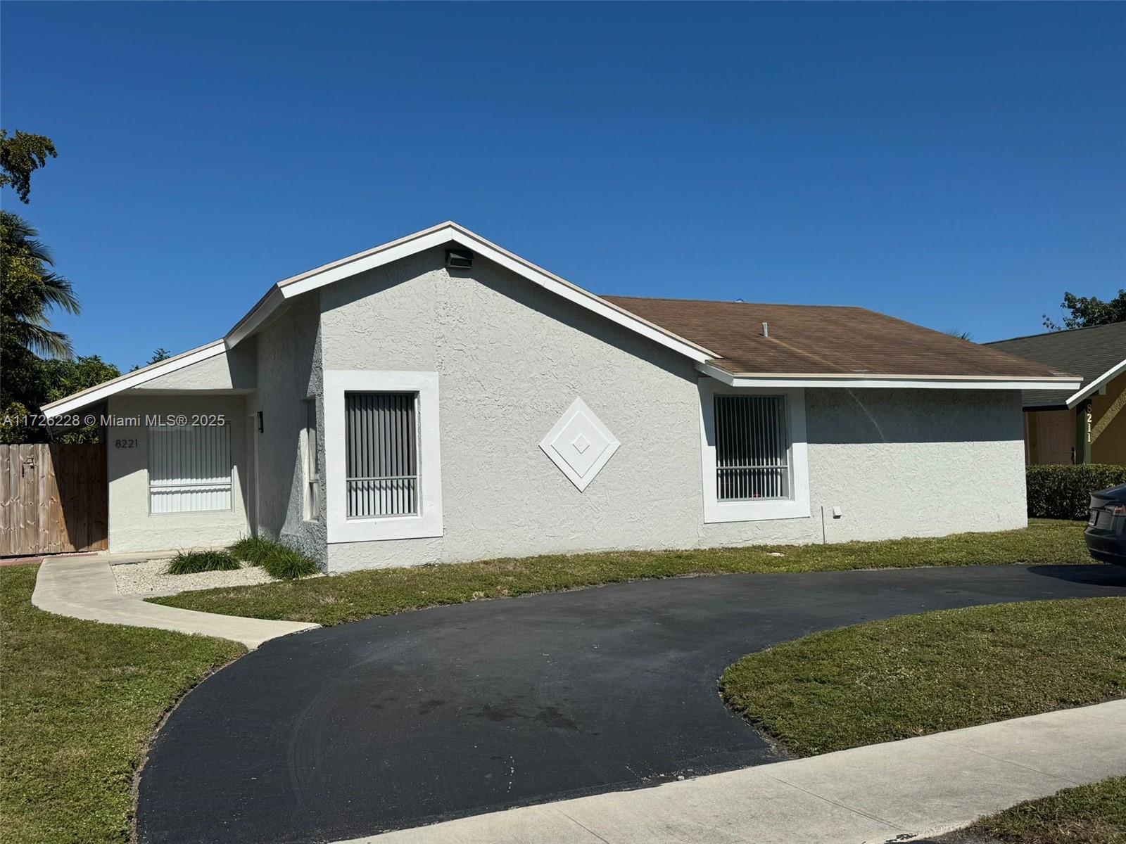 Don’t miss this fantastic opportunity to own a charming 3-bedroom, 2-bath, one-story home in a prime location. Enjoy the updated pool with an AZURE finish, glass tiles, and a Travertine patio—ideal for cooling off or entertaining. The low-maintenance landscaping and fenced backyard offer room for pets or children, with a safety fence around the pool. Additional features: circular driveway and no HOA fees.
The open kitchen has stainless steel appliances and white cabinetry, flowing into a large dining/family room. A separate living room with natural light adds appeal. The spacious laundry room can double as an office or den. The primary bedroom includes a walk-in closet, and the bathrooms are tiled. Luxury vinyl floors and tile throughout.
