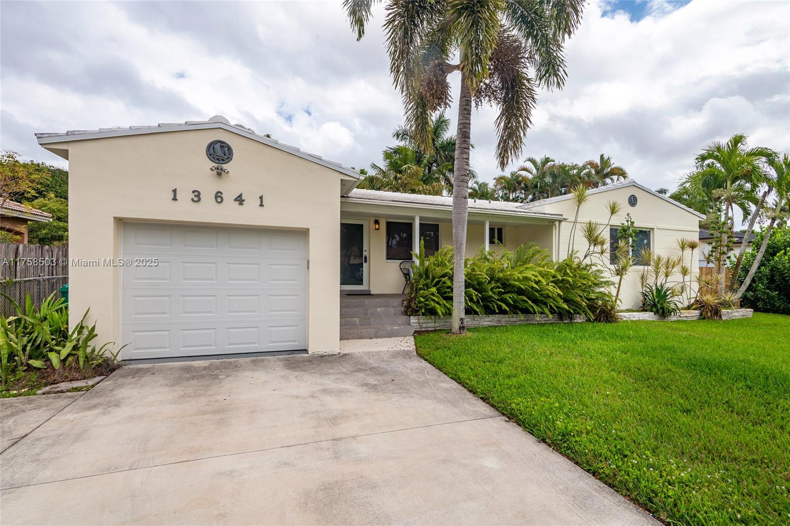 Beautiful 3/2.5 North Miami garage home with an Updated Kitchen & Bathrooms, AC, Impact Windows, Newer Tile Roof (2018). A cute front porch, a spacious back porch with a large overhang providing plenty of shade and perfect for barbeques & entertaining guests, and a great backyard.