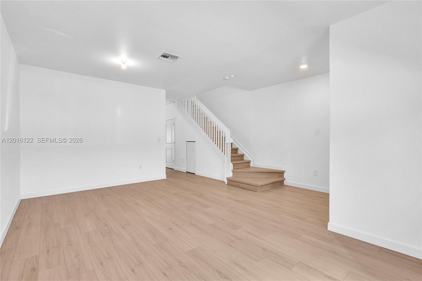 BEUTIFUL HOME COMPLETELY REMODELING NEW KITCHEN NEW BATHROOMS FRESH PAINTING TILE IN PATIO UPDATE AND ALL FLOORS IN THE UNIT IN FINE LAMINATE WOOD.