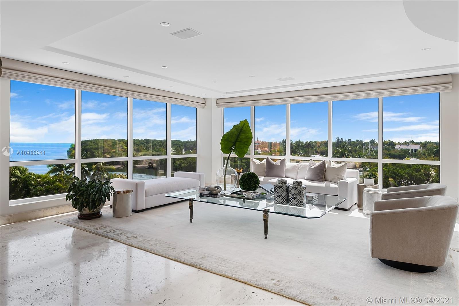 7,600sf of pure elegance awaits the new owner of this unique, combined “A” line unit in the prestigious and well located Gables Club complex. With direct views of the Miami skyline and Biscayne Bay, this unit offers a rare opportunity to really “have it all” at one’s fingertips: full service concierge, on-site bar/restaurant, gym/spa/beauty salon, tennis courts, putting green, heated pool, marina, 24hr security and valet parking.  This is convenient and worry free living at its best. Originally configured as a 6 bedroom unit, it currently has 4 bedrooms plus a gym/playroom and a library/office/den. Encompassing two floors with an elevator as well as a stunning interior connecting staircase, this waterfront luxury home in the sky represents the epitome of luxurious, care free living.