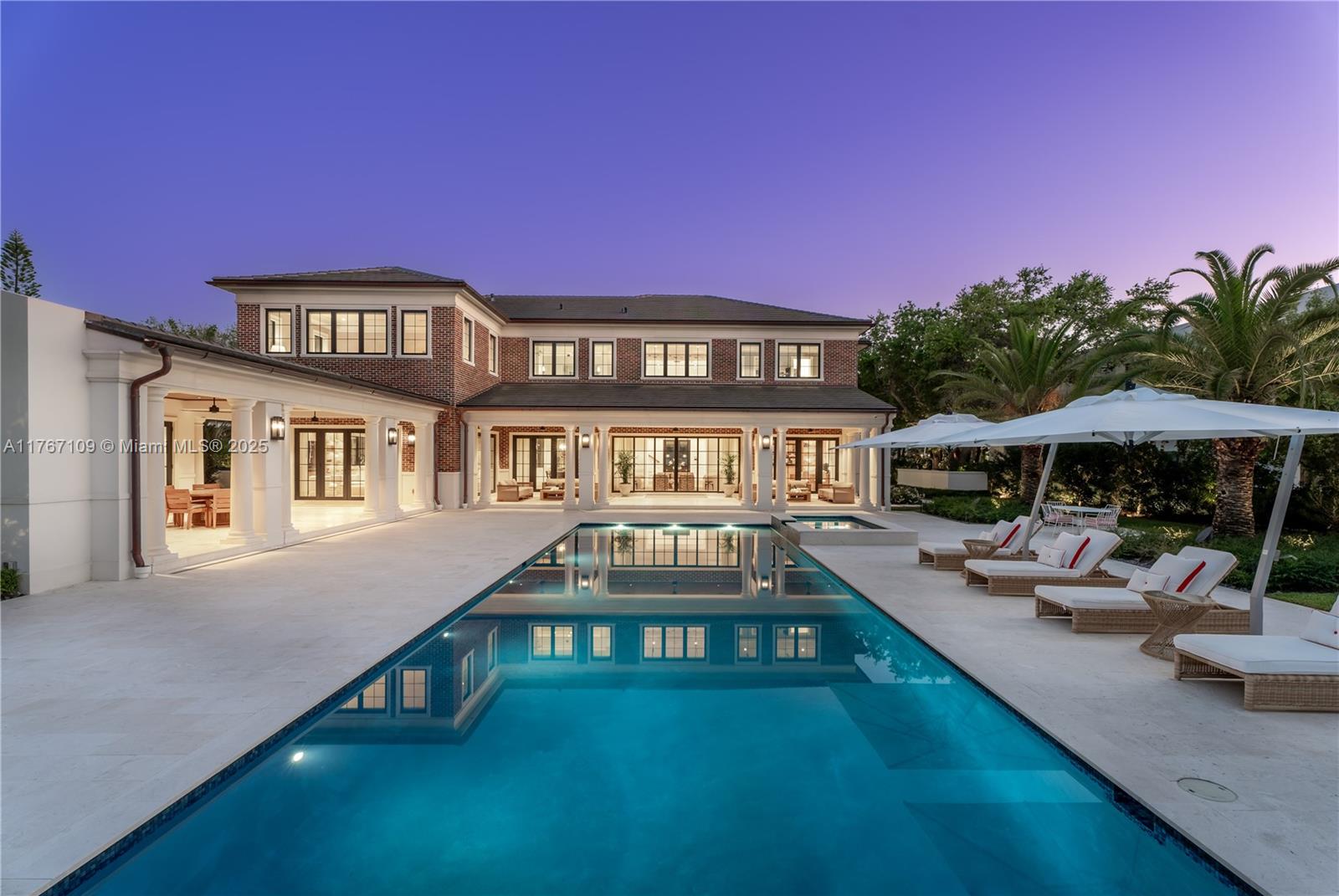 Literally the best custom home EVER built in Pinecrest! A sprawling estates of Connecticut inspired transitional Georgian Architecture. Spanning over 9,878 total square feet, this 2023 masterpiece offers 7 bedrooms, 8.5 baths, and a level of craftsmanship very rarely seen. Designed for one who will not compromise on anything but exceptional quality. Architectural features include precast columns, crowns, trims, moldings & a unique red brick facade. Nestled on nearly an acre, this home boasts high ceilings, custom millwork, rare marble walls, designer wallpapers & hardwood floors. A gourmet chef’s kitchen features a Bertazzoni range, Gaggenau fridge/freezer, and steam oven. Outdoor entertainment includes a summer kitchen, sauna, and a heated saltwater pool with a jacuzzi.