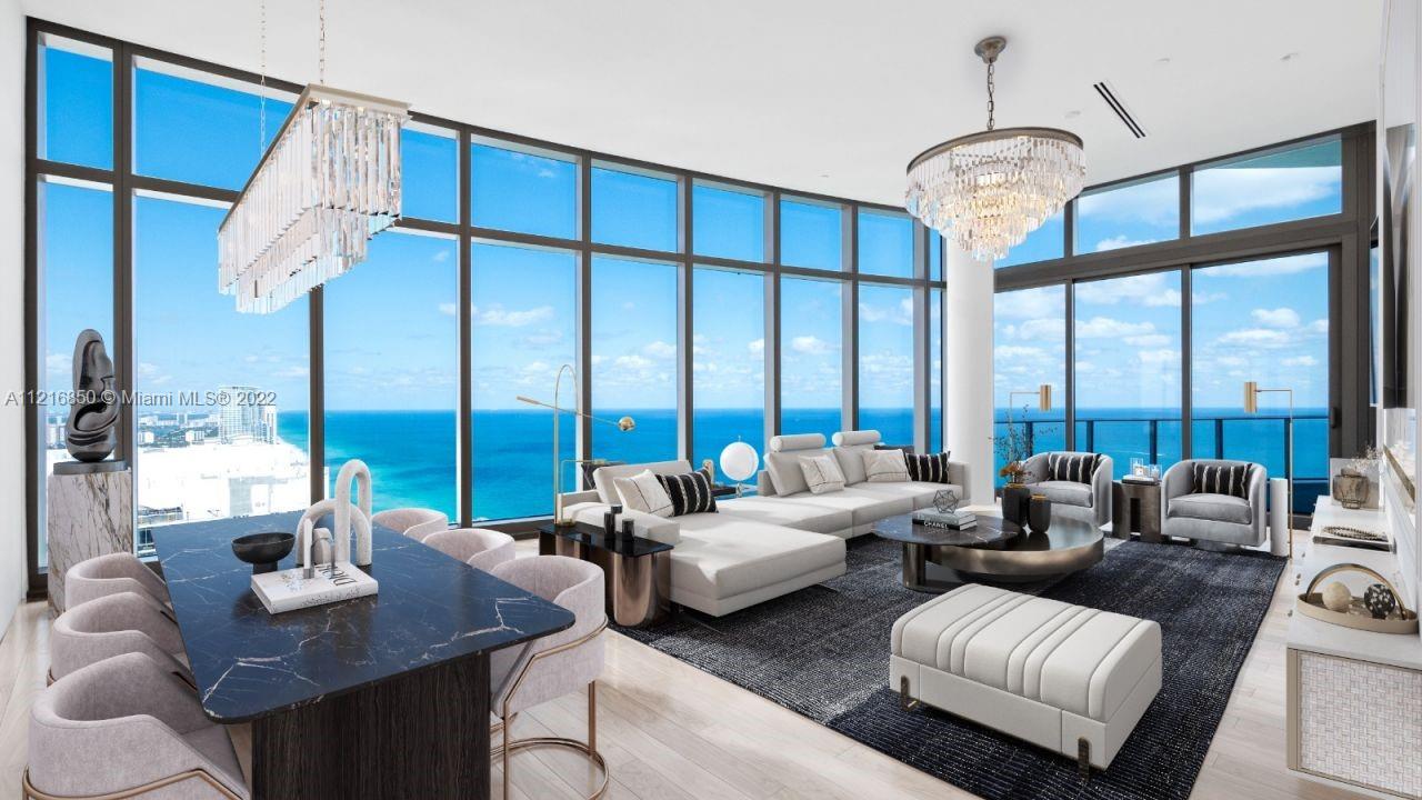 One-of-a-kind lower penthouse with 13 ft ceilings. This flow-through residence features three bedrooms, four and a half bathrooms, and a den with unobstructed city and water views. Building features world-class services and amenities including concierge, valet, restaurant and room service, beach and pool services, two swimming pools, a hot tub, movie theater, oceanfront gym and spa, wine lounge, game room, daily complimentary continental breakfast, and much more.