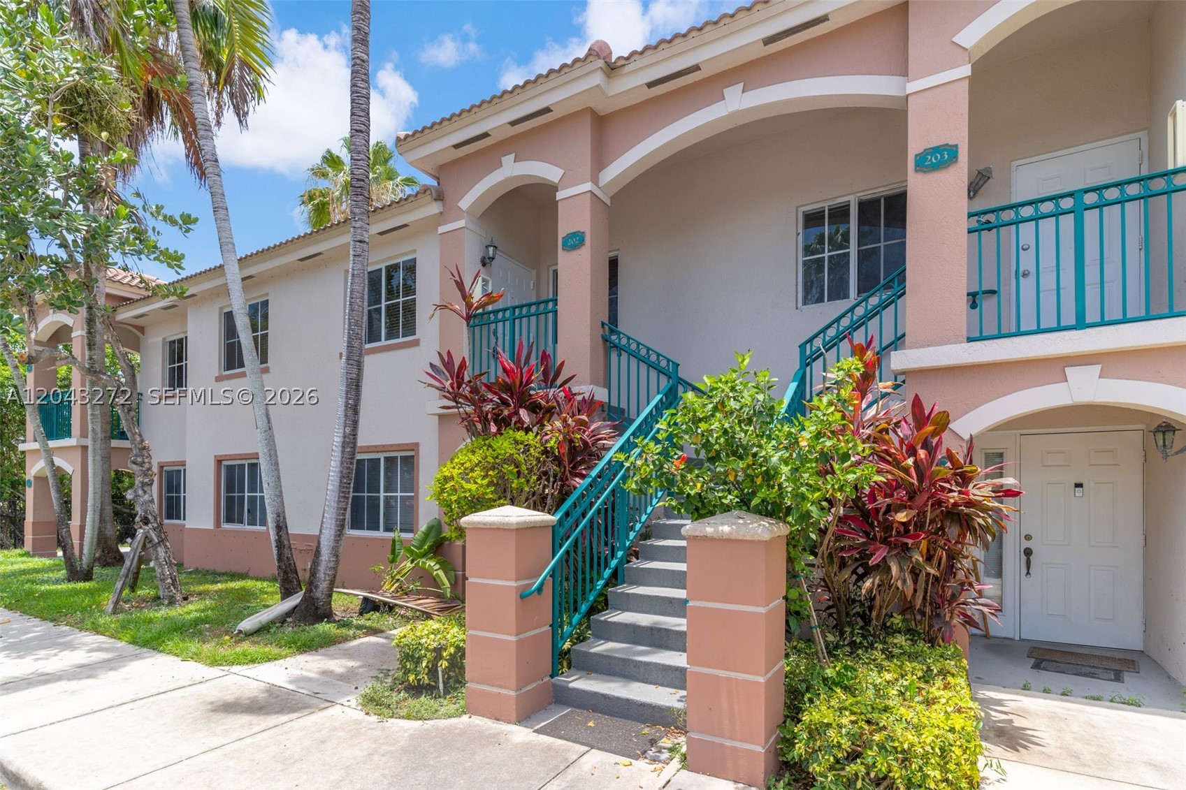 2/2 apartment with tile floors throughout, fresh paint, and abundant natural light. Open living and dining area connects to a functional kitchen with cabinetry, appliances, and good storage. The unit offers generous closet space and is located in a gated community with security, in-unit laundry, amenities, and convenient access to Publix, shopping, dining, daily essentials, and expressways.