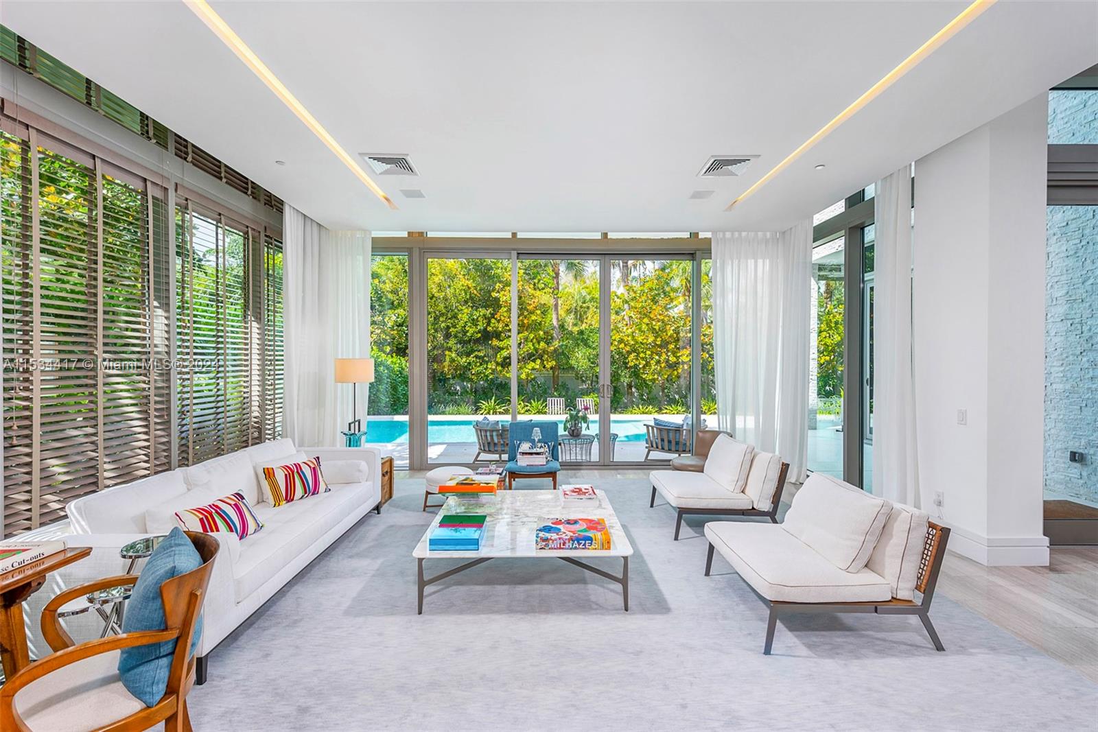 Step into this stunning Oceana Villa where you are greeted by a harmonious blend of modern elegance and coastal charm.  Nestled in the exclusive enclave of Key Biscayne and situated amidst swaying palms and steps away from the beach. This incredible 2 story residence is a seamless fusion of style and comfort with floor to ceiling windows and doors that bathe the interior in natural light, exceptional custom finishes with an open floor plan offering 5,074 Sq Ft under A/C including 7 ample bedrooms, 5.5 baths, family room, gourmet kitchen, tons of storage, gorgeous pool and terrace with BBQ, gated community with 24/7 security, restaurant, tennis, fitness center/spa and so much more.  Oceana Villa offers the ultimate in peace of mind, exclusivity, serenity and luxury at it's finest.