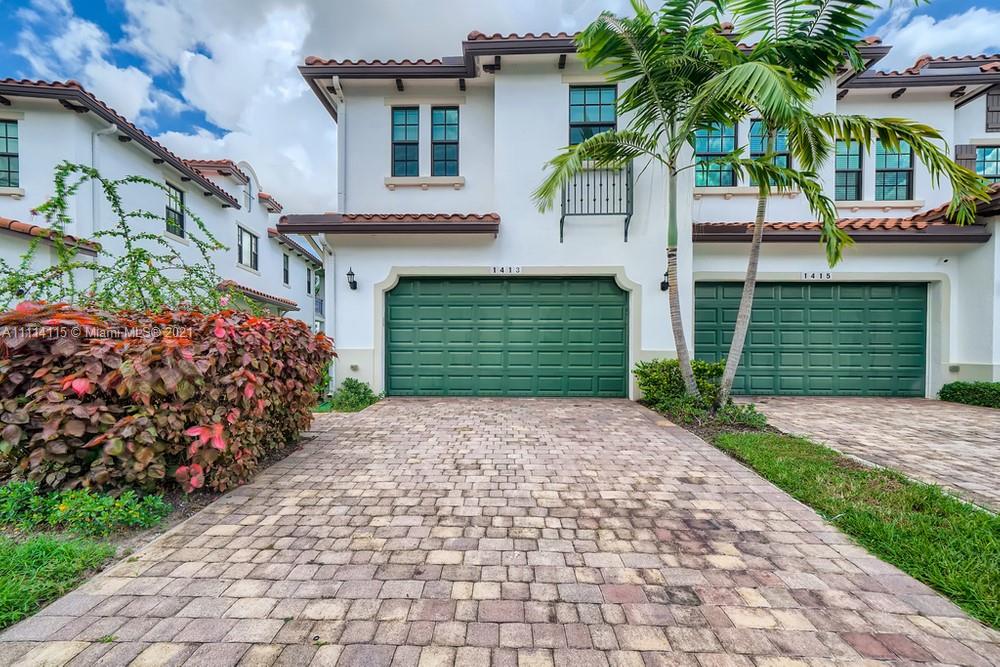 This stunning 3 bedroom, 2.5 bathroom townhome is located in the desirable Raintree Townhome Community! Enter the spacious living room that opens into the dining room and large kitchen! The kitchen offers an island, stainless steel appliances, and a pantry, a home chef's dream. You will love the patio with a great view of the lake, perfect for enjoying your morning coffee. The primary bedroom is spacious with plenty of room for a sitting area, a balcony with a lake view, two sizable closets, an en-suite bathroom with a double sink vanity, and a soaking tub. The gated community boasts a gym and pool. The home is conveniently located near eateries, shopping, schools, parks, and easy access to the Florida Turnpike. Do not miss the opportunity to see this impressive home!