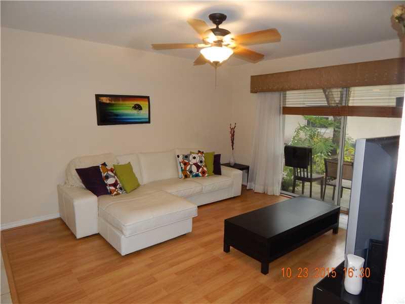 Fabulous condo - Fully renovated, first floor, Garden Apartment. Ceramic & Wood Floors, New Stainless Steel Appliances, Granite Kitchen Counter Tops, New Cabinets in a nice sized kitchen. Comes with new Washer and Dryer.  centrally located in the communit y of Club Quarters of Raintree in Pembroke Pines.