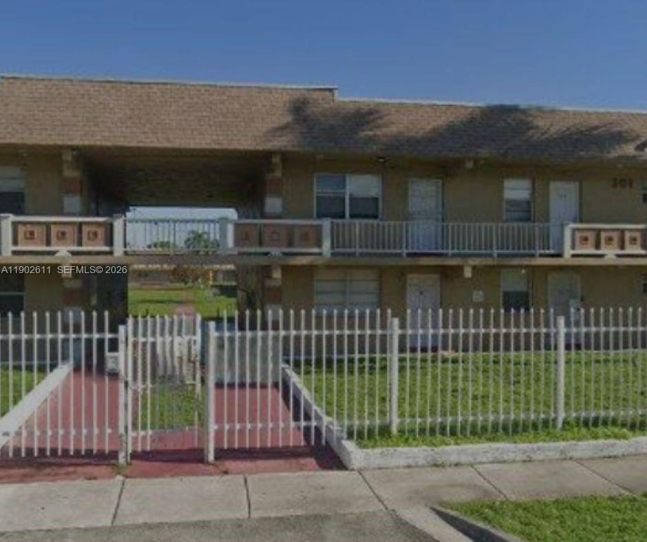 Beautiful and well-maintained 2-bedroom, 1-bath condo located in the heart of Miami Gardens. This bright first-floor unit features 730 sq ft of living space, a spacious layout, tile floors throughout. New impact windows. Enjoy a quiet community with assigned parking and guest parking. Excellent location close to major highways, shopping centers, school, and parks. Walmart is just in front of the building. Perfect for investors. Association approval required. The unit is rented $1700 per month.