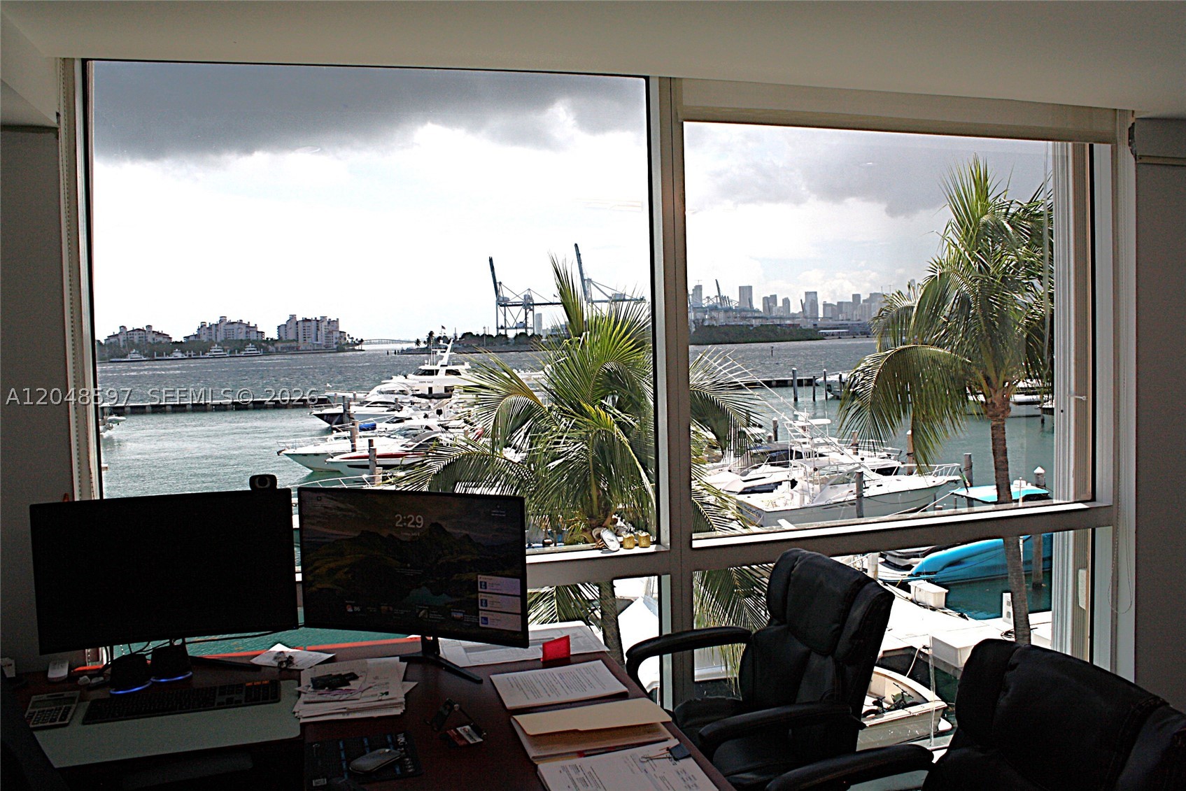 Positioned within the prestigious Yacht Club at Miami Beach, this turnkey office space offers an inspiring waterfront setting overlooking the vibrant marina. Bathed in natural light and framed by sweeping views of yachts and the sparkling bay, the suite delivers a rare blend of sophistication, serenity, and functionality — ideal for real estate professionals, yacht brokers, creative firms, boutique agencies, or any business seeking a standout Miami Beach address.

The office features an efficient open layout with modern finishes, high ceilings, and floor-to-ceiling windows that elevate the daily work experience. Direct access to the building’s  FOUR (4) DEDICATED PARKING SPOTS, SURROUNDED BY additional PARKING OPTIONS AND OR A VALET SERVICE PROVIDED BY THE BUILDING enhances convenience and prestige for both clients and staff.

Located in the heart of South Beach’s SOUTH OF 5TH district, the Yacht Club places you moments from the best of Miami Beach: Sunset Harbour, Lincoln Road, world-class dining, and seamless connectivity to the mainland. With its unmatched marina views and professional atmosphere, this office offers a rare opportunity to anchor your business in one of Miami Beach’s most desirable waterfront communities.