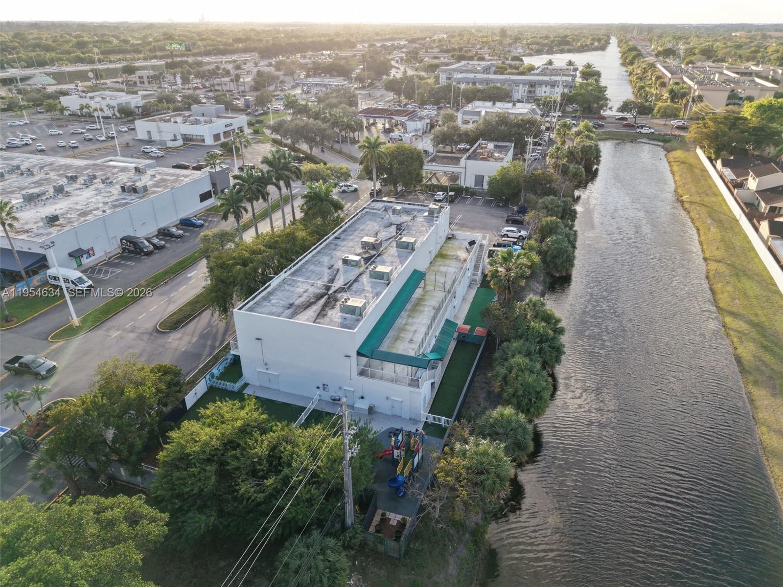 Prime Investment Opportunity: Modern 13,704 Total SF Commercial Building in a high-demand Hialeah - Miami Lakes location. Built in 2008, this impeccably maintained property offers a unique blend of immediate income and vacant space for expansion or secondary use.
The first floor (6,673+ AC SqFt) currently houses a premier, fully operational preschool/daycare with a 120-student capacity. The sale is all-inclusive, featuring both the real estate and the established business (valued at $800,000) with top-tier, modern finishes. The owner offers flexible transition options to ensure seamless operational continuity.

The second floor is currently vacant and move-in ready, offering a versatile open layout for the new owner’s specific needs—ideal for professional offices, medical suites, or expanding the educational facility. Additionally, the property features a massive 2,254 SqFt second-floor terrace, which provides a significant value-add opportunity to enclose and further increase the total AC square footage.
This is a rare find: a high-quality, 21st-century construction that delivers a turnkey business on level one while providing a massive, vacant second floor for immediate owner-user occupancy or additional leasing income. Pristine condition, extremely clean, and strategically located.