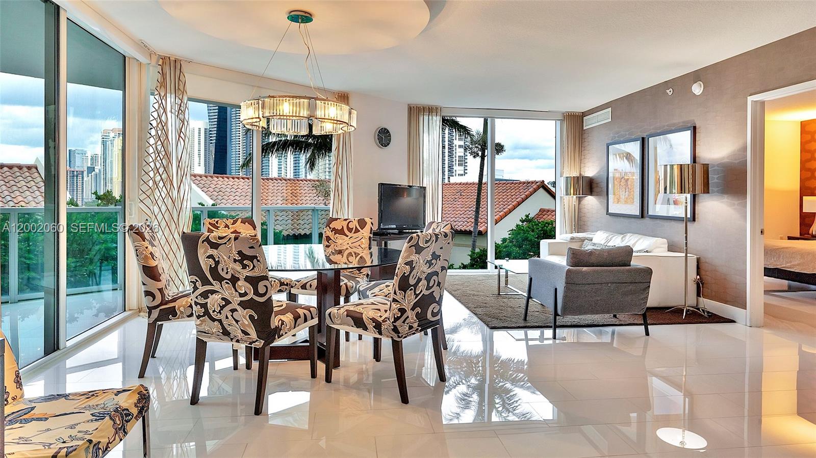 Beautifully furnished 3-bedroom, 2-bath residence located in the desirable St. Tropez community in Sunny Isles Beach. This spacious unit features a bright open layout with floor-to-ceiling impact windows, allowing for abundant natural light and tranquil garden views. Modern kitchen with stainless steel appliances and ample cabinetry, ideal for everyday living and entertaining. Primary suite offers a walk-in closet and a well-appointed bathroom with separate tub and shower. Private balcony provides a peaceful outdoor space to enjoy the lush surroundings.
Resort-style amenities include 24-hour concierge and security, valet parking, fitness center, spa, pool, and private beach club access. Conveniently located just steps from the beach, shopping, dining, and minutes to Bal Harbour Shops and Aventura Mall. Offered fully furnished and move-in ready.