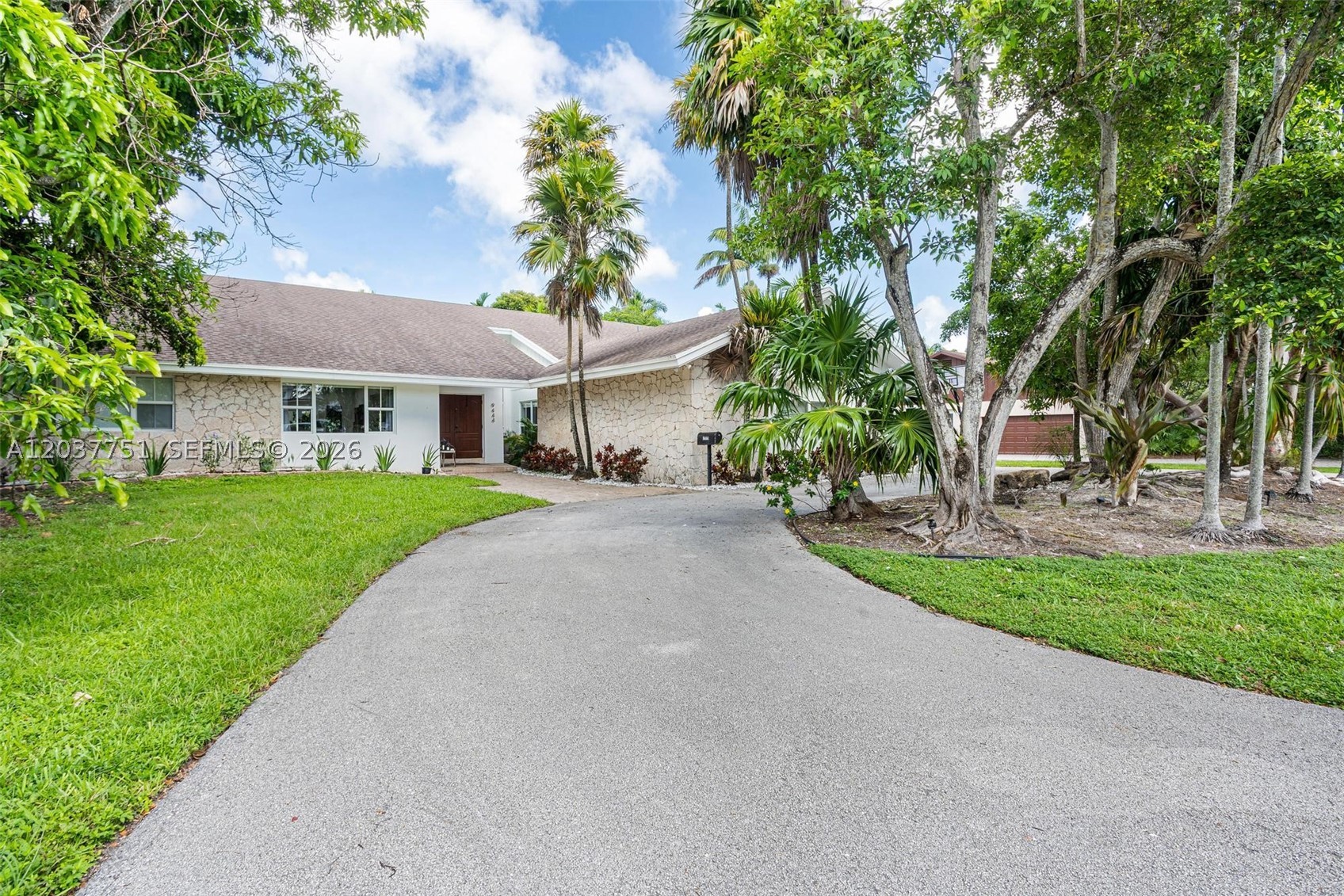 Spacious 4 bedroom plus den, 3 bathroom home in desirable North Pinecrest. This well maintained residence features impact windows, a newer roof, stainless steel appliances, oversized washer and dryer in a dedicated laundry room, updated interior doors, newer air conditioning units, laminate flooring, septic system and a grandfathered pool slide.

The home offers high ceilings, an open living and family room, a large primary suite, an oversized kitchen, a 2 car garage and a spacious swimming pool with cabana bathroom. The split floor plan provides privacy with the primary suite separated from the additional bedrooms.

Located on a quiet street near Ludlam Road, Downtown Dadeland, Trader Joe’s and Whole Foods. Situated within the Pinecrest Elementary and Palmetto school district, this home offers comfort, convenience and an excellent North Pinecrest location.