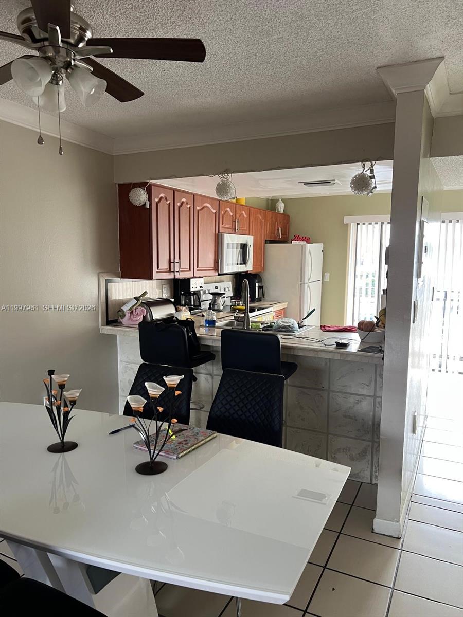 Excellent opportunity in the desirable Carmel Townhomes community! This spacious unit features a functional layout with abundant natural light, tile flooring throughout, and comfortable living areas. Enjoy the convenience of an in-unit washer and dryer, private balcony ideal for relaxing, living kitchen on the first floor and 2 bedroom on the seconds floor (townhouse style). and assigned parking.
Located in the heart of Hialeah, just minutes from Westland Mall, major highways including Palmetto Expressway (826) and Okeechobee Rd, as well as schools, shopping, and dining. The community offers amenities such as a pool and well-maintained common areas.
Perfect for both homeowners and investors, with rental potential and low association fees. Don’t miss this great value in a prime location!