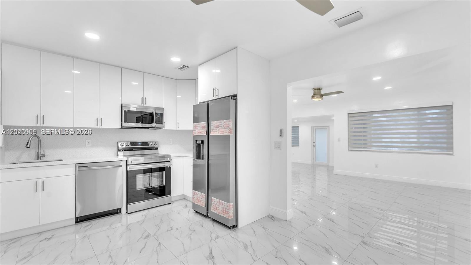 Beautifully Remodeled, 2bed/1 bath home with separate efficiency/in-law quarters with 1bed/1bath and Washer and Dryer Utility. Brand new kitchen and floors, spacious backyard and parking. Don't miss this opportunity - it's ready for you to Purchase!