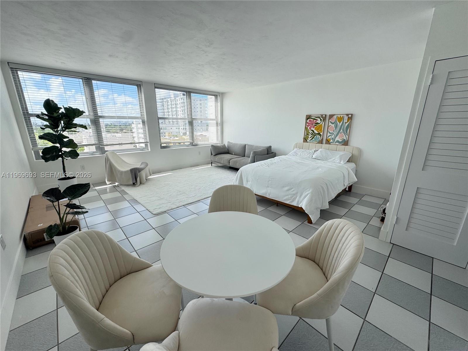 Modern studio with stunning sunset and city views in the heart of Miami Beach. The HOA fee includes amenities such as beach service, high-speed internet, cable, 24/7 security, a full-time doorman, fitness center, package concierge, and access to two pools.

The unit features brand-new hurricane-impact windows, an updated kitchen with stainless steel appliances, and ample storage throughout.

Triton Tower has completed its 50-year recertification and maintains partial reserves, offering added peace of mind for buyers.

Ideally located directly on the beach and boardwalk, the building is surrounded by five-star resorts, luxury condos, the vibrant Faena District, and some of Miami Beach’s most sought-after dining destinations.