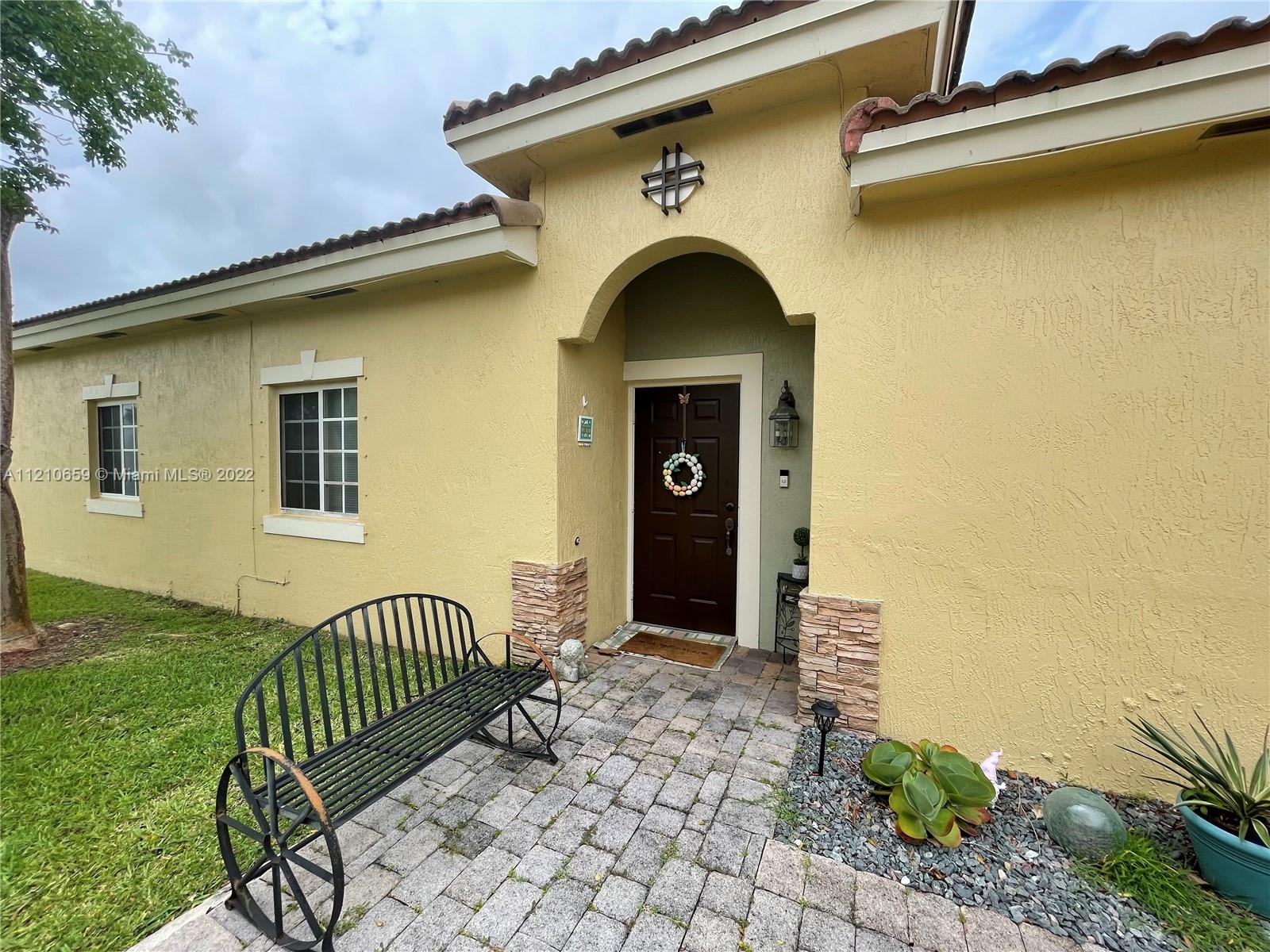 Beautiful 3 bed, 2 bath town home with one car garage with lake view from the patio, in the lovely gated community Ventura at Malibu Bay.