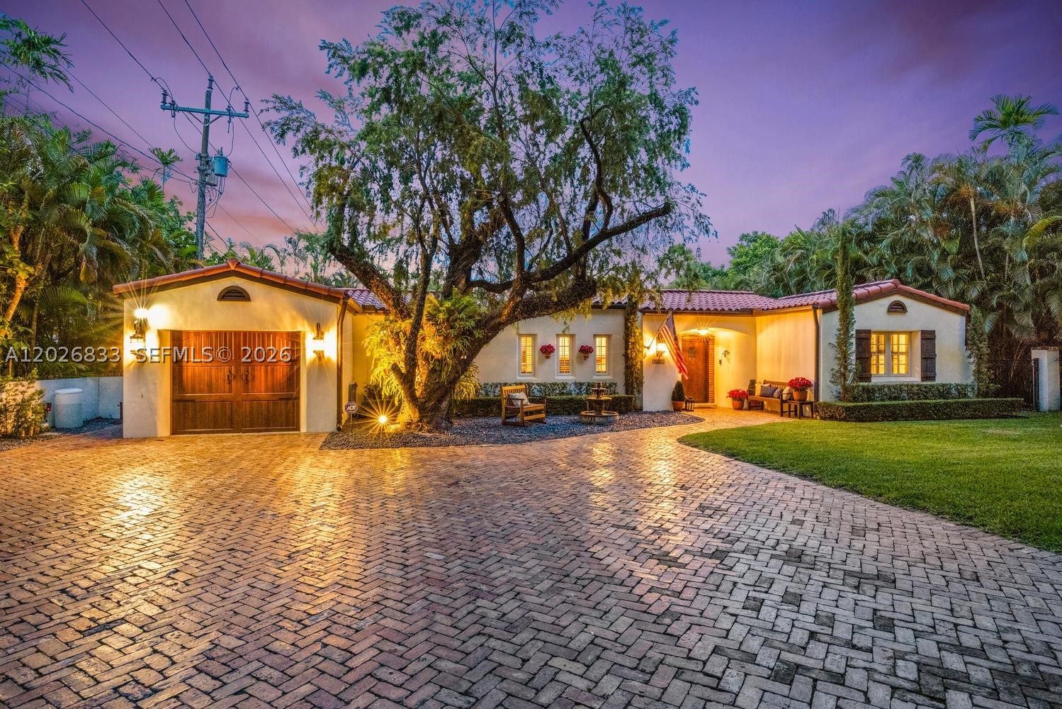 This beautifully preserved 1936 residence is a rare piece of Coral Gables history. Situated on an oversized 12,525 SF lot, the property features 3 bedrooms, 4.5 bathrooms & an office in the main residence, plus a detached structure with a full cabana bath. Blending timeless Mediterranean Revival architecture with thoughtful updates, the home showcases vaulted ceilings with exposed wood beams, a wood burning fireplace with a hand hewn timber mantel, arched openings stone flooring, impact windows throughout & an updated kitchen with custom cabinetry & quartz countertops. Enjoy a sparkling oversized pool surrounded by elegant travertine pavers, lush landscaping & an exceptional Granada Blvd location near Granada Golf Course, The Biltmore Hotel, the Coral Gables Country Club & children's parks.
