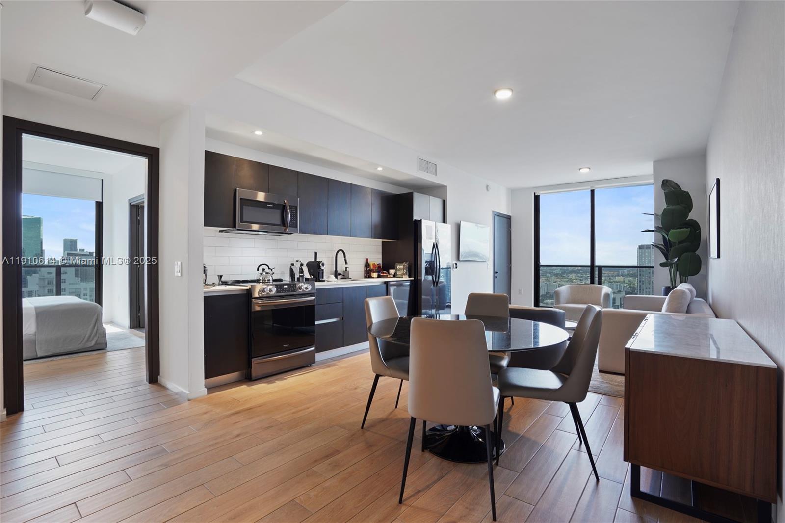 Experience elevated living at The Elser Residences in this beautifully appointed 3-bed, 3-bath residence. Thoughtfully designed with breathtaking Biscayne Bay and Downtown Miami views, this home features 9’2” ceilings, floor-to-ceiling impact windows, smart keyless entry, and an Ecobee smart thermostat for ultimate comfort. The open layout blends modern style with everyday functionality. Residents enjoy a collection of curated amenities, a vibrant lifestyle, and unmatched access to Miami’s top dining, entertainment, and cultural destinations. A rare opportunity to own a sophisticated, turn-key home in one of Miami’s most desirable buildings.