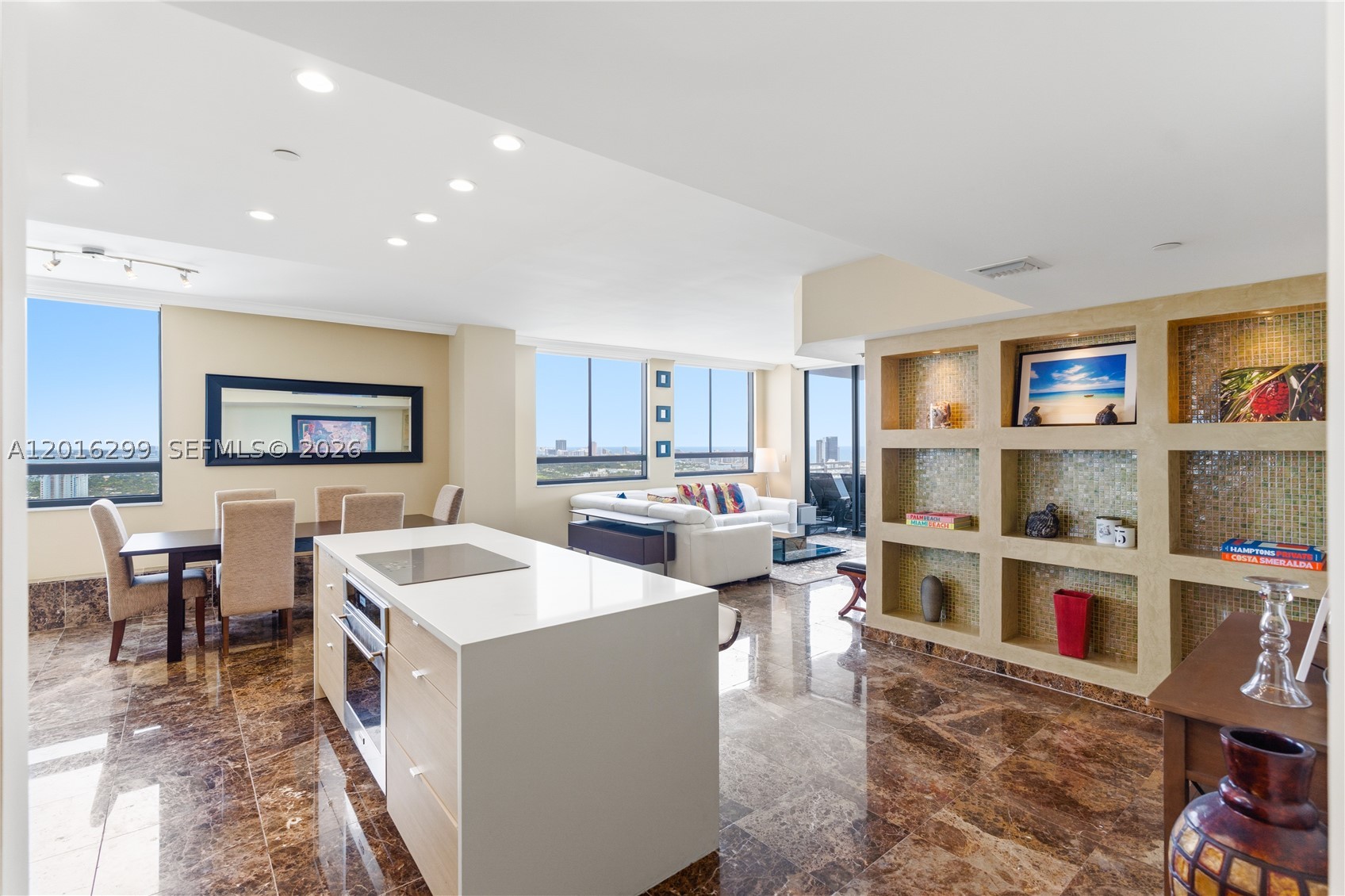 Spacious and Private penthouse living on the 36th floor with unobstructed views of the ocean, South Beach, and Biscayne Bay from two large private balconies and wide windows in every room. This beautiful residence features 9 ft ceilings, marble floors, a renovated kitchen, high-end finishes, walk-in closets, and a private storage closet. Enjoy your morning coffee from the primary bedroom balcony while watching the boats on the bay. Located at The Waverly, a full-service bayfront condominium offering a heated pool, BBQ area, tennis court, putting green, fitness center, party room, convenience store, 24-hour concierge, security, and valet. Just a short walk to Lincoln Road, restaurants, shops, supermarkets, and the beach. Residence offers 1,831 sq ft including balconies, three garage parking spaces, cable and internet included, and the building is dog friendly.