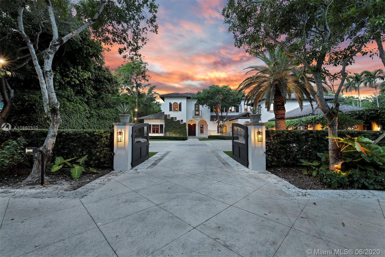 COMPLETELY RENOVATED!! ONE OF A KIND LAKEFRONT custom home built by architect ZEB JAROSZ in Hammock Lakes - a GATED community in Coral Gables. This Italian Villa features 5 bedrooms, 6 bathrooms, and 2 half baths along with a Guesthouse with 1 bedroom, 1 bathroom on a lot over 42,000 SF with over 9,000 total SF. Feel like you're in Tuscany with the lush landscaping, oversized pool, circular pond, full privacy, and lakefront home. Interior features include; completely remodeled kitchen, split floor plan with great spaces, master suite with oversized walk in closets, gym, and a bar. Community has 24/7 gate officer, off-duty Coral Gables police, and an amazing park. In close proximity to top schools, local hotspots, Coconut Grove, and Miami International Airport. A must see!