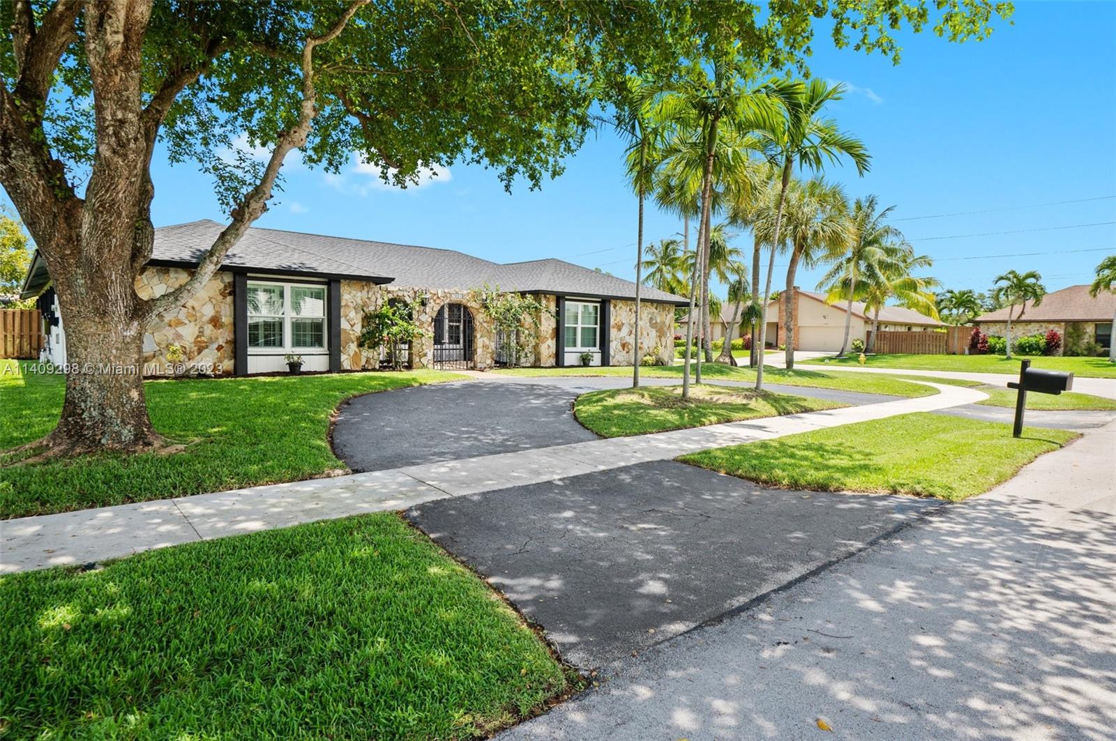 Welcome to Marcano Estates in Plantation, Step into this exquisite 4/2 home with 2-car garage, nestled on a tranquil cul-de-sac. On a large corner lot. No HOA granite countertops, stainless steel appliances, breakfast area,  formal living & dining rooms. Family room provides a perfect setting for relaxation & quality time with loved ones. Separate laundry room updated second bath master bedroom has a walk-in closet with built-in organizers. High impact windows newer roof & insulation a reverse osmosis water system w/heavy metal remover & Fiberoptic cable Step outside & discover a true outdoor oasis, screened patio & koi pond offers a tranquil space to unwind, while the spacious fenced yard is perfect for children to play or hosting memorable gatherings with friends and family. Nearby parks