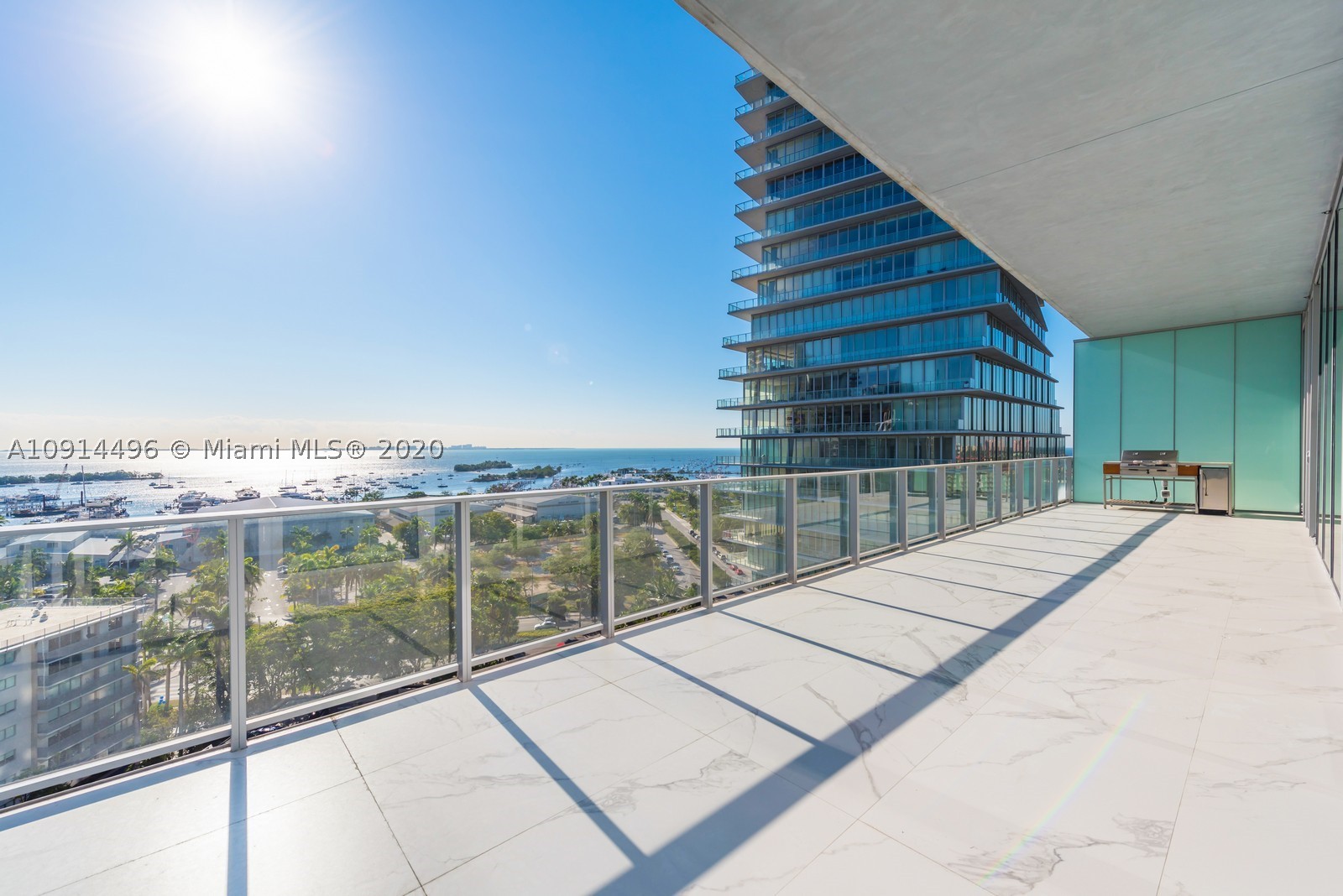 Spectacular unit at  THE GROVE AT GRAND BAY, Miami's hottest waterfront luxury condominium. Designed by world-renowed interior designer STEVEN G, this fully finished unit has an open floor plan with ample natural light in every room and gorgeous panoramic views of the city and biscayne bay. It also has 12-foot ceilings, MIELE appliances, and an electric outdoor kitchen.
Experience the ultra-exclusive lifestyle of this award-winning BJARKE INGLES GROUP complex. Amenities include 24-hour concierge and butler service, lap and roof-top pools, a modern spa, a state-of-the-art fitness center with spinning room, game room, pet spa, library, a private restaurant and valet parking services.
