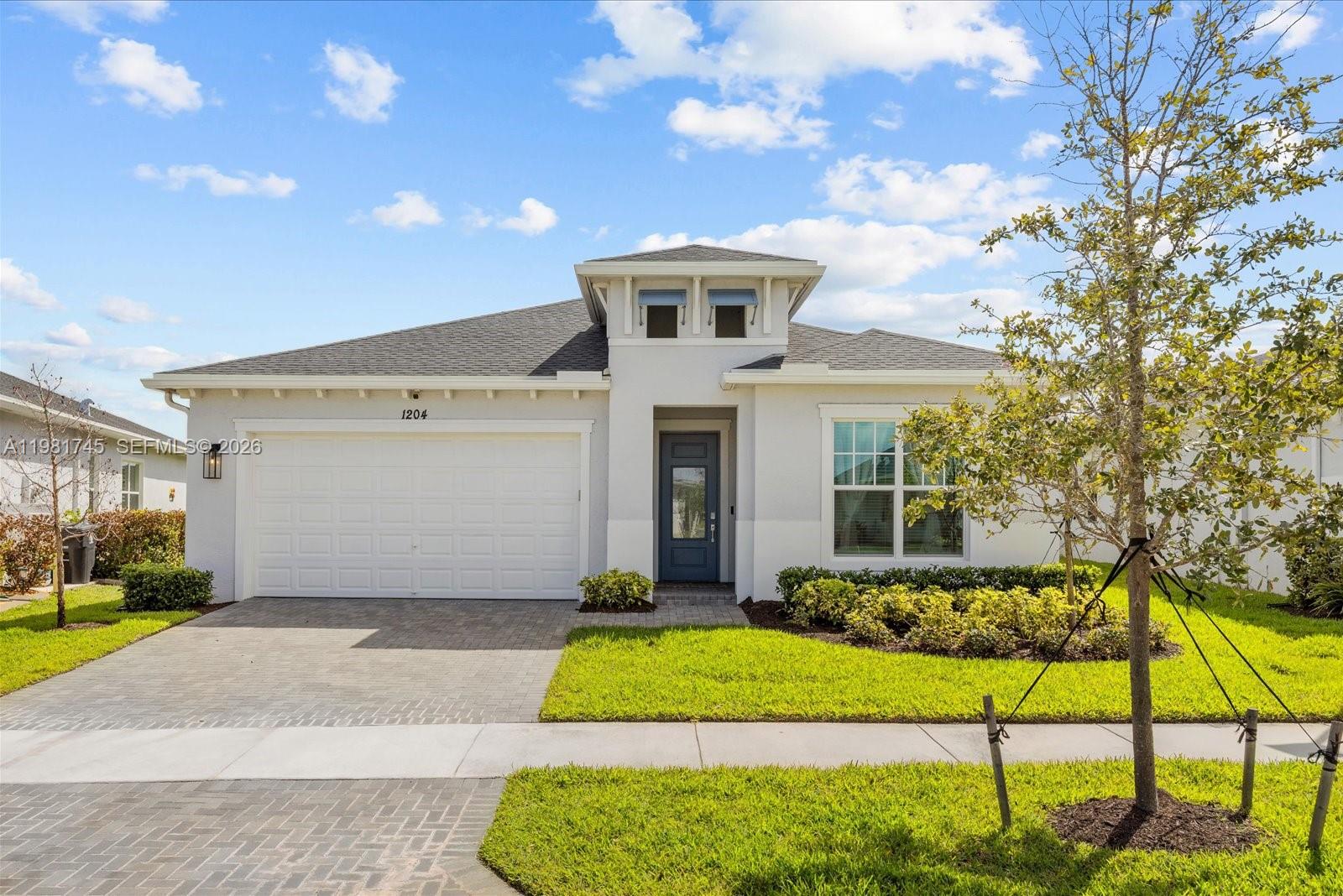 Welcome to this beautifully designed Key Largo floor plan located in the desirable Veranda Preserve 55+ community in Port St. Lucie. This spacious single-family home offers 3 bedrooms and 3.5 bathrooms, thoughtfully designed for comfort and modern living. The home features remote-controlled zebra blinds and a reverse osmosis water filtration system for the pool, enhancing the outdoor living experience. Residents enjoy a vibrant lifestyle with upscale resort-style amenities, including a stunning community pool and an active calendar of events such as movie nights, bingo, pickleball, water aerobics, and more. Experience low-maintenance living in one of Port St. Lucie’s most engaging active adult communities.