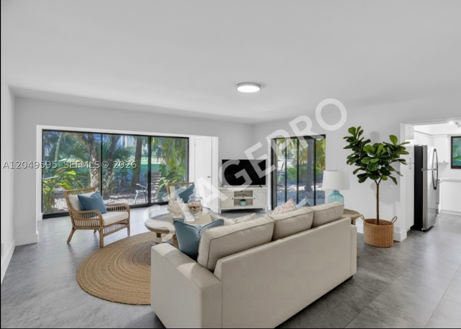 Beautiful Corner Villa overlooking Turnberry Golf Course! Discover this 1-bedroom corner unit in the heart of Aventura, surrounded by lush greenery and serene golf course views. Enjoy the privacy of your own front entry with patio and a rear covered patio, perfect for relaxing or entertaining. Inside, you will find a modern white kitchen with a cozy breakfast area that can also serve as a home office, nursery or sitting room. This charming home features a washer and dryer in the home for your convenience. The community offers 24-hour gated security and just steps away you'll find a heated pool, tennis courts, and fitness center. Walk to Aventura Mall, restaurants and scenic walking paths. Resort-style living at its best! PET FRIENDLY