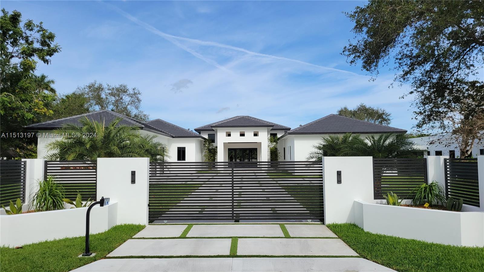 **  NEW CONSTRUCTION!  ** This magnificent estate is situated on a private cul-de-sac. The beautiful home offers 7,508 sqft under roof and 5,469 sqft of A/C area. The estate is built on approximately an acre lot and has an electric gate at the front entrance. The property features six bedrooms, five and a half bathrooms, and a gym/office or playroom that is conveniently located next to the Master Bedroom. The home also includes a pickle-ball court, a large covered terrace with a summer kitchen, a built-in wine cellar, and a 22' X 44' swimming pool. Other highlights:  a 3-car garage, a soaking tub in the ensuite bathroom, security cameras, and wifi hubs throughout the house.  This established family neighborhood is an excellent school zone.
