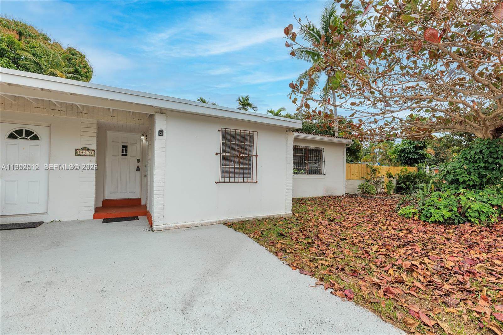 Beautiful home in Biscayne Gardens featuring two units, each with 2 bedrooms and 1 bathroom. Total living area of 1,679 SqFt with one-story CBS construction and ceramic and porcelain flooring throughout. Spacious layouts with great natural light, plus a large fenced yard, patio, and BBQ area. Property includes central A/C and washer & dryer. Generous lot size with strong rental potential, ideal for investors or multi-generational living. Prime location near major highways, schools, and shopping. No HOA. Excellent income-producing opportunity. Easy to show.