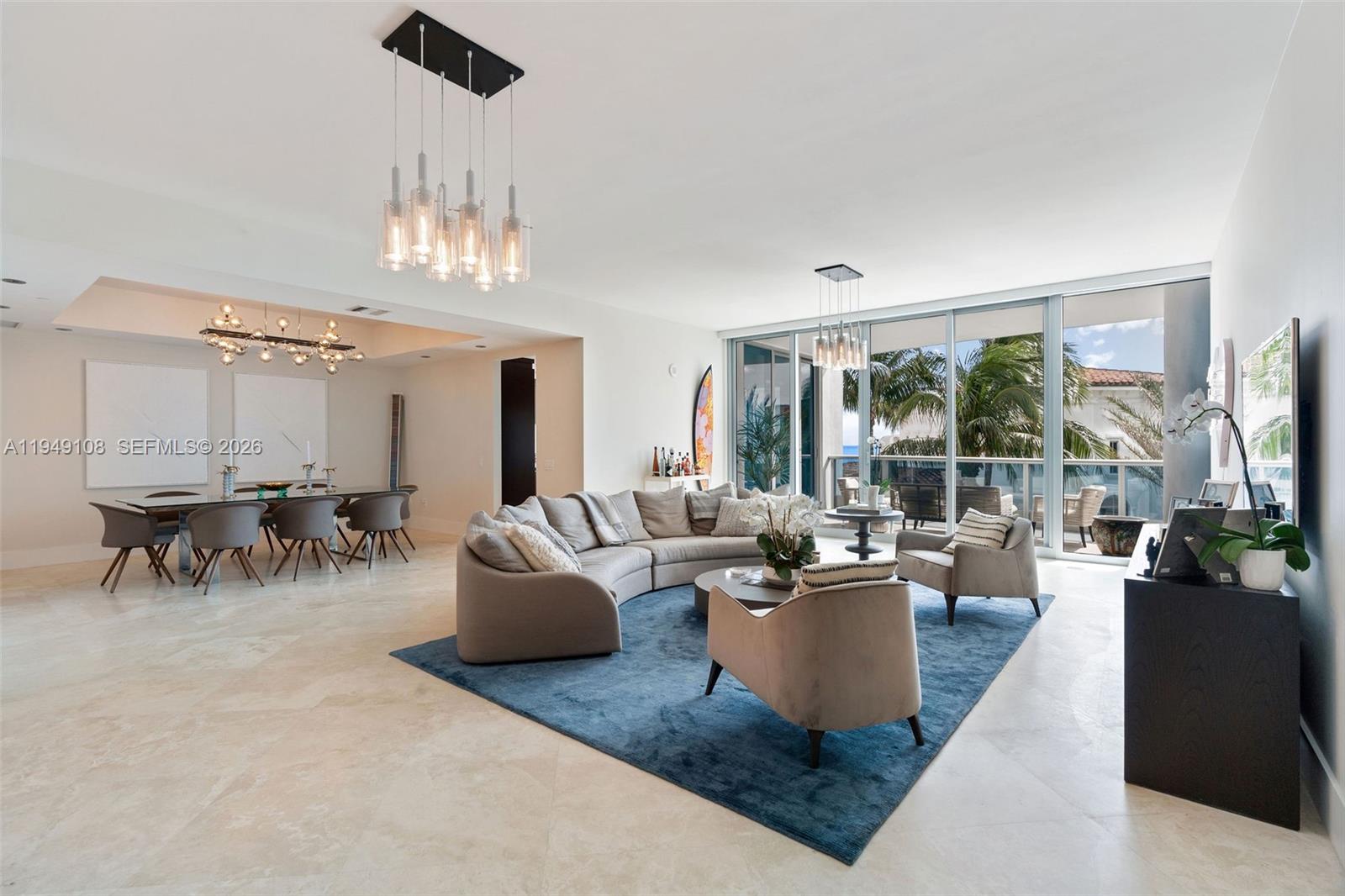 Spectacular residence at the exclusive Bath Club offering 4,135 SF with 5 bedrooms—including a custom kids’ bunk room—and 5.5 baths. A private elevator opens directly into the home, revealing an expansive, thoughtfully designed layout with separate living and family rooms, formal dining, and a gourmet eat-in kitchen equipped with Sub-Zero and Miele appliances—ideal for effortless entertaining. The oversized primary suite features a spacious sitting area and two walk-in closets. Additional highlights include two assigned self-parking spaces and an optional poolside cabana available for purchase. Enjoy resort-style amenities including two Har-Tru clay tennis courts, poolside food service, two on-site restaurants, a state-of-the-art fitness center, spa, sauna, children’s play area, and a wide stretch of full-service beach. The Bath Club offers guard-gated entry, exceptional staff, and concierge services. Centrally located in Mid-Beach, moments from world-class dining, Bal Harbour Shops, and the Design District.
